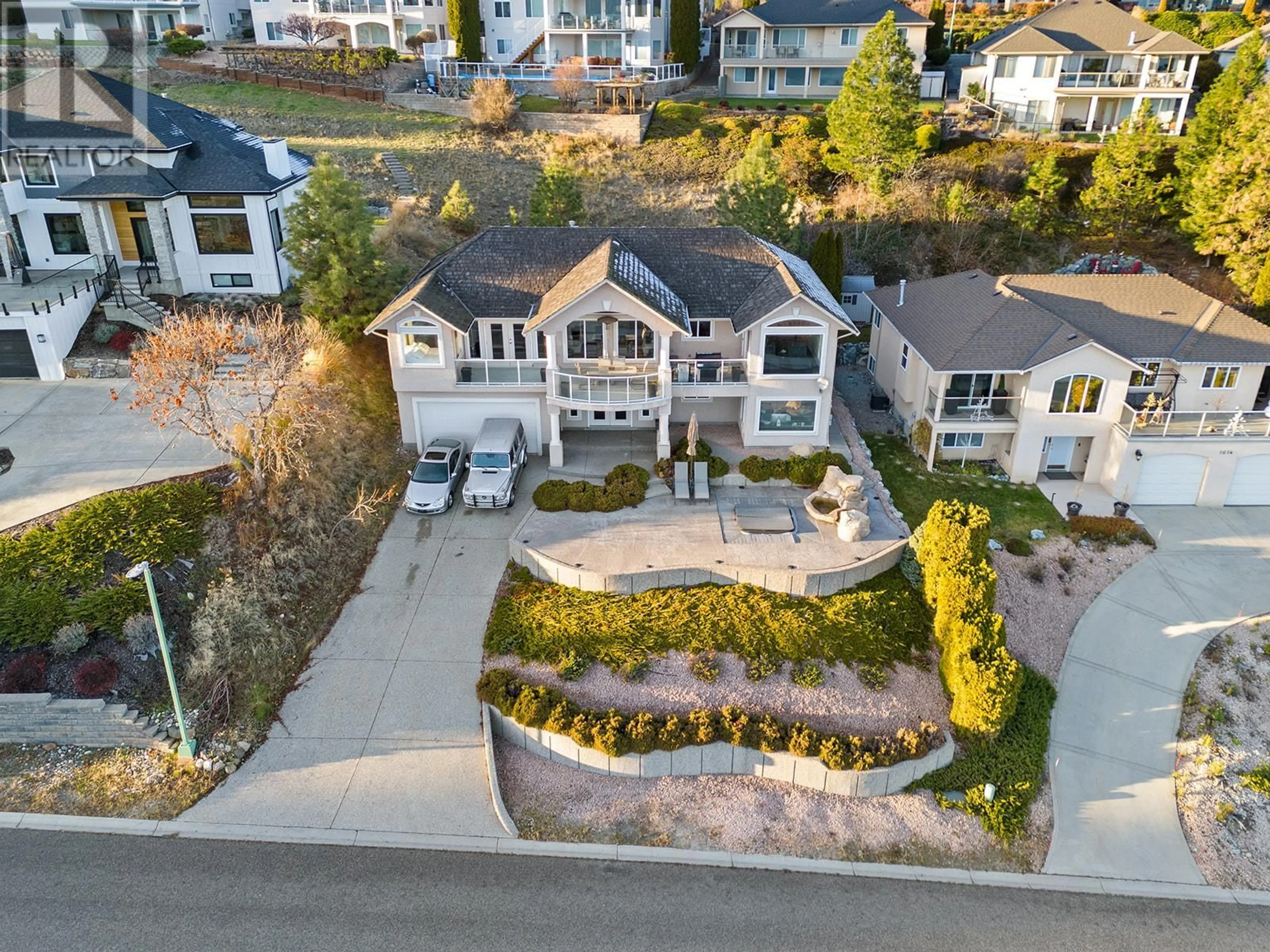 A pic from outside/outdoor area/front of a property/back of a property/a pic from drone, street for 1620 Mission Hill Road, West Kelowna British Columbia V4T2M4