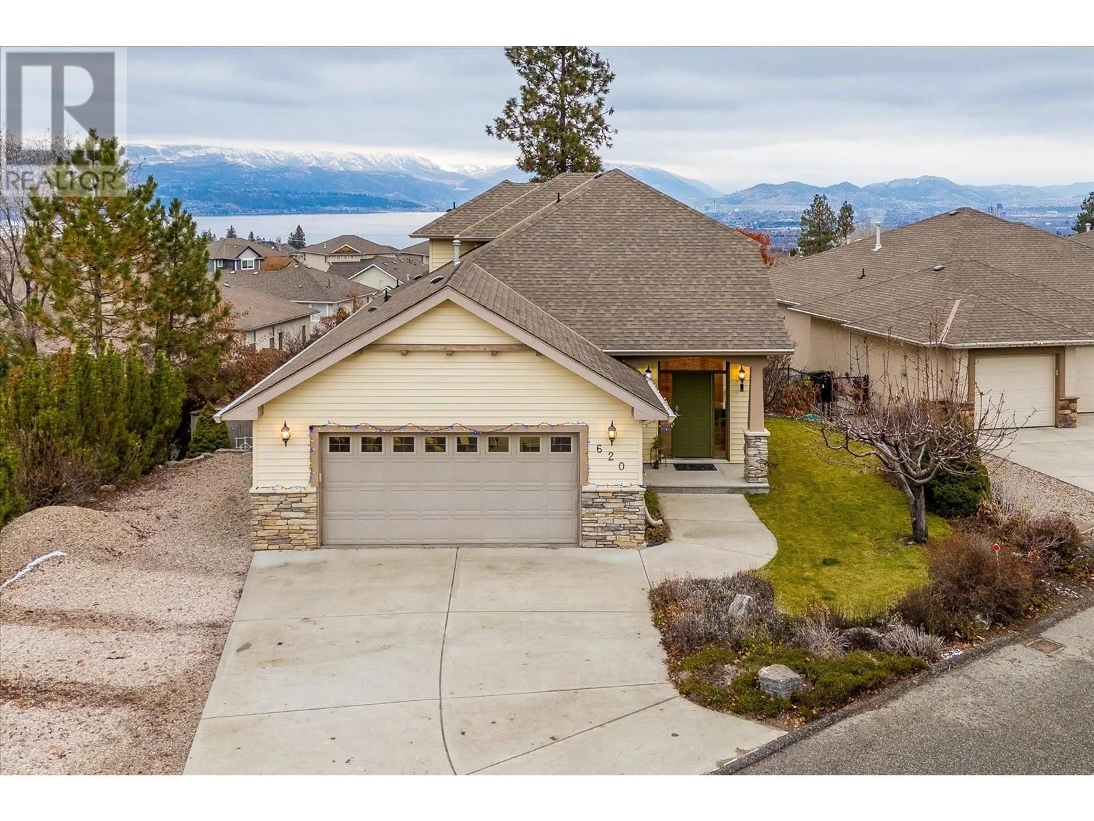 A pic from outside/outdoor area/front of a property/back of a property/a pic from drone, water/lake/river/ocean view for 620 Arrowleaf Lane, Kelowna British Columbia V1W4Y5