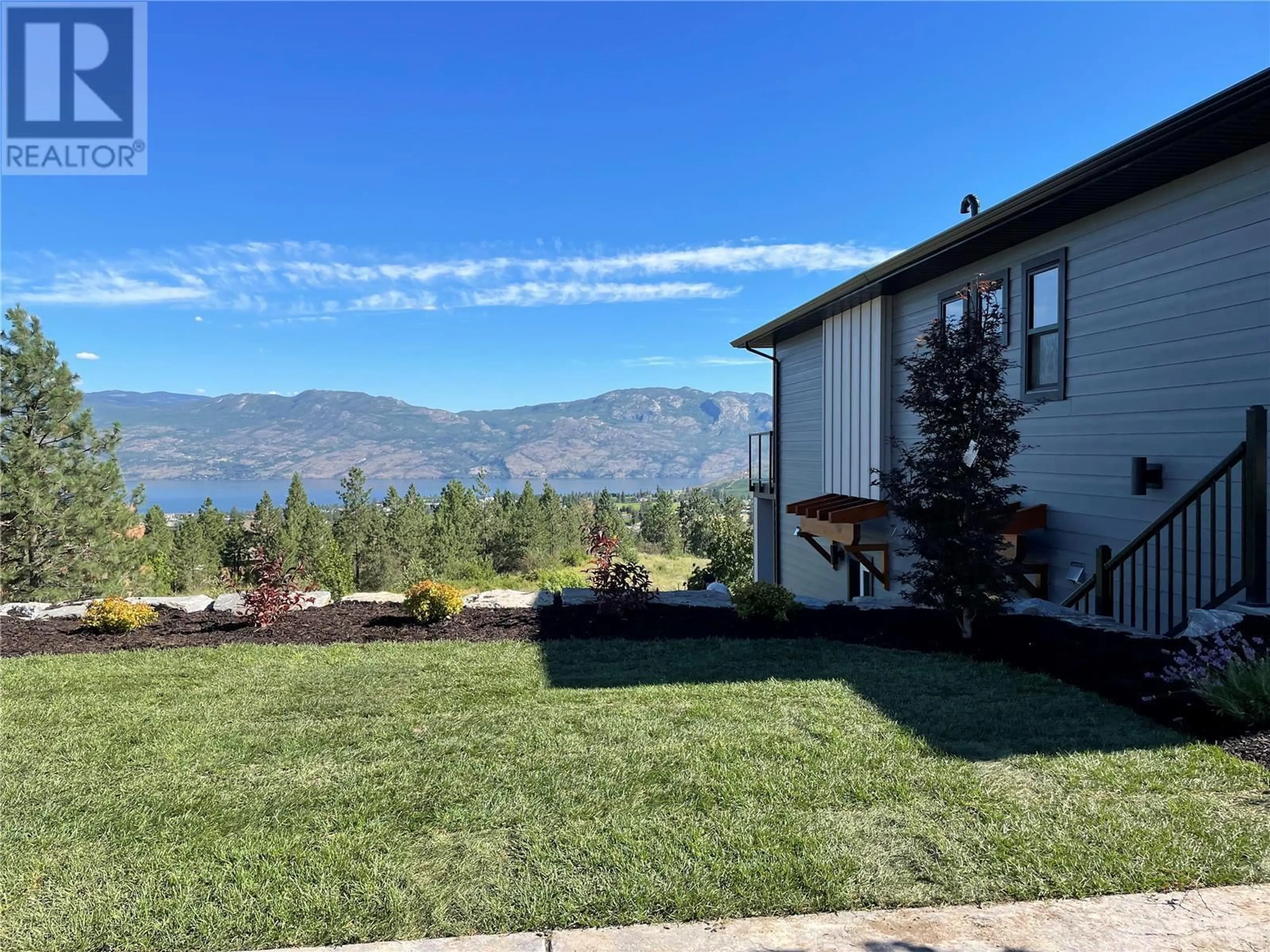 A pic from outside/outdoor area/front of a property/back of a property/a pic from drone, mountain view for 2803 COPPER RIDGE DRIVE, West Kelowna British Columbia V4T2X3