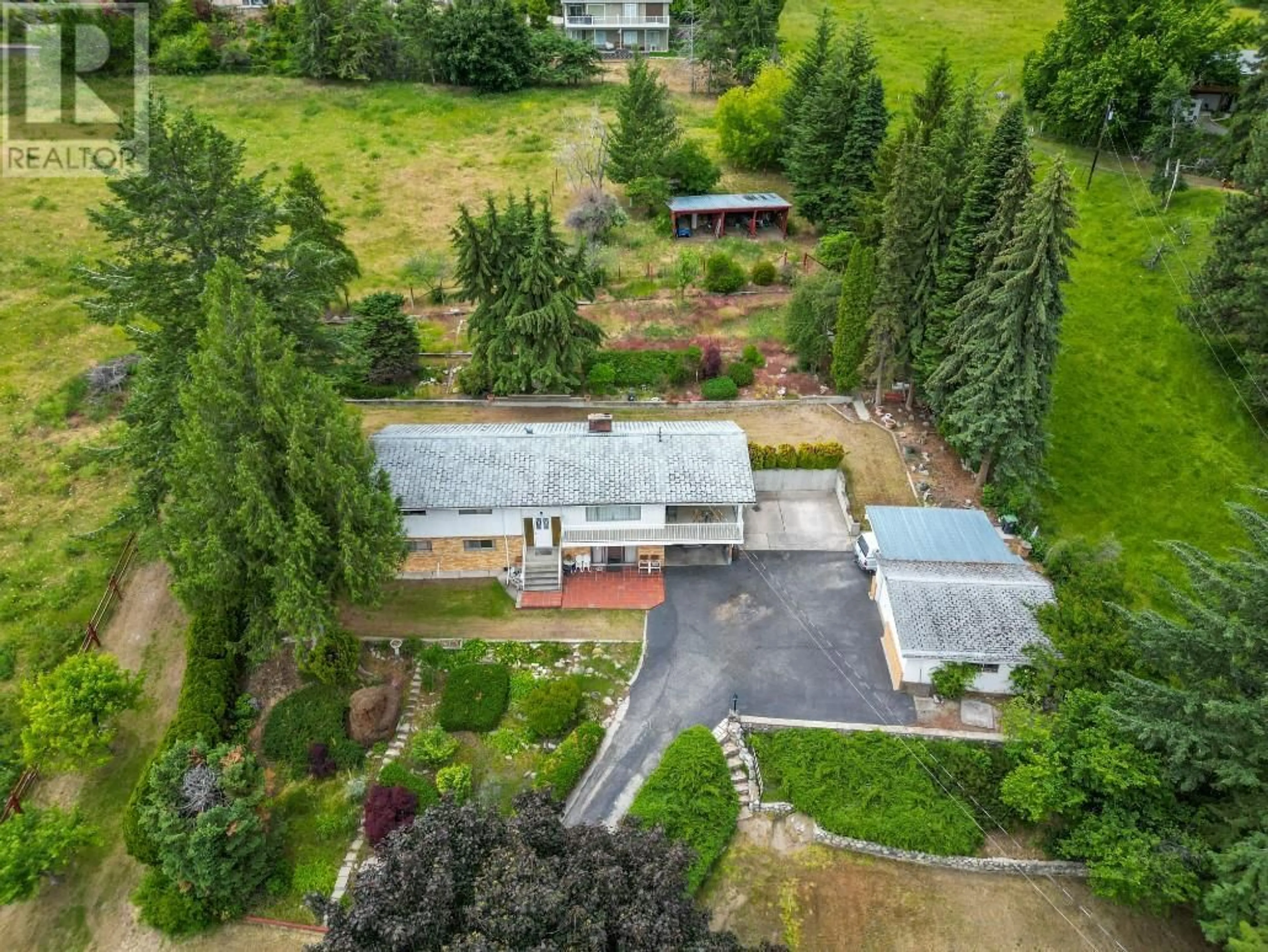 A pic from outside/outdoor area/front of a property/back of a property/a pic from drone, unknown for 3620 WEBBER ROAD, West Kelowna British Columbia V4T1J9