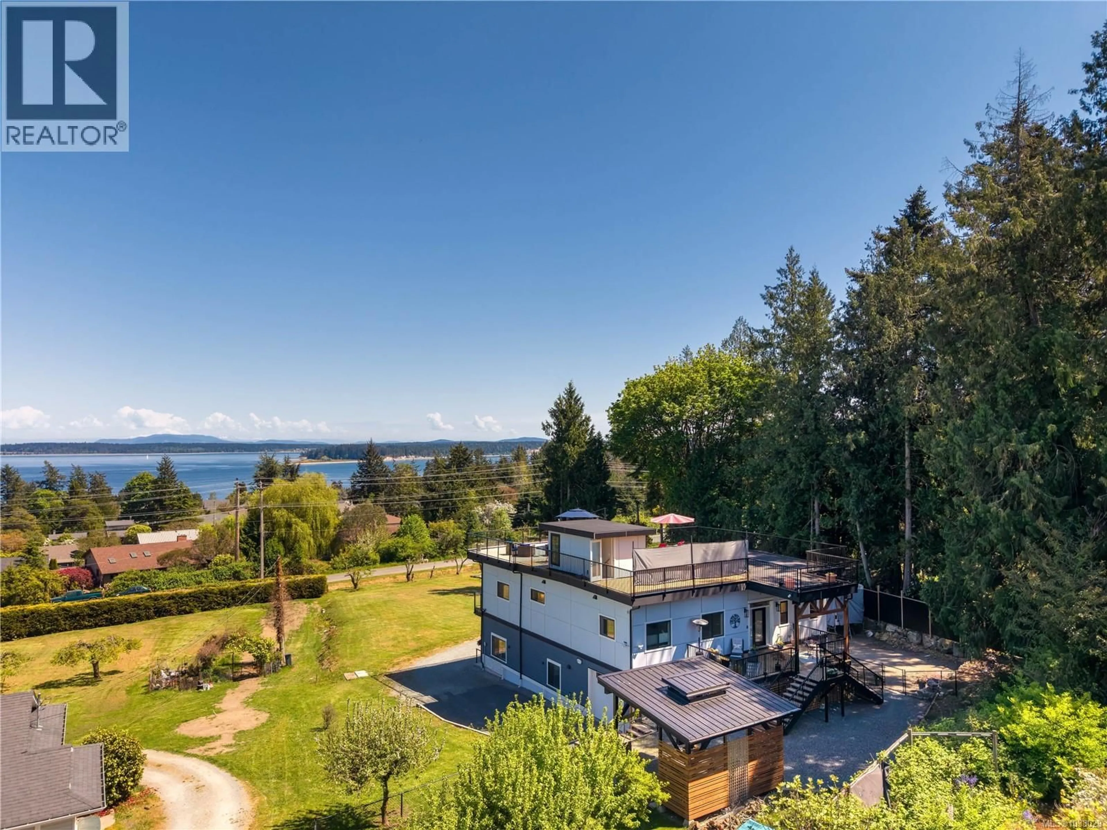 A pic from outside/outdoor area/front of a property/back of a property/a pic from drone, water/lake/river/ocean view for 8630 ALDOUS TERRACE, North Saanich British Columbia V8L1L2