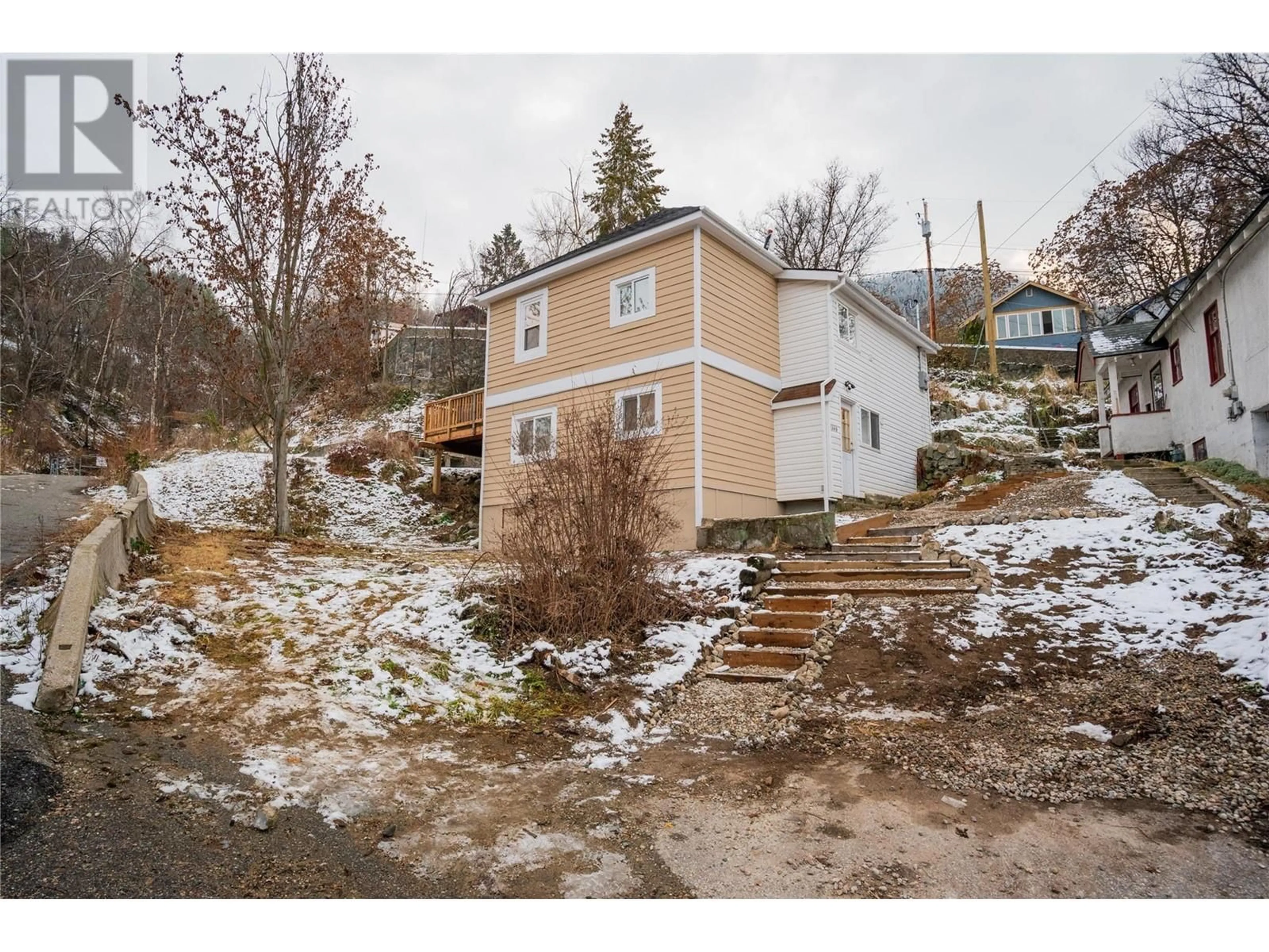 A pic from outside/outdoor area/front of a property/back of a property/a pic from drone, street for 1440A Ravine Street, Trail British Columbia V1R4J4