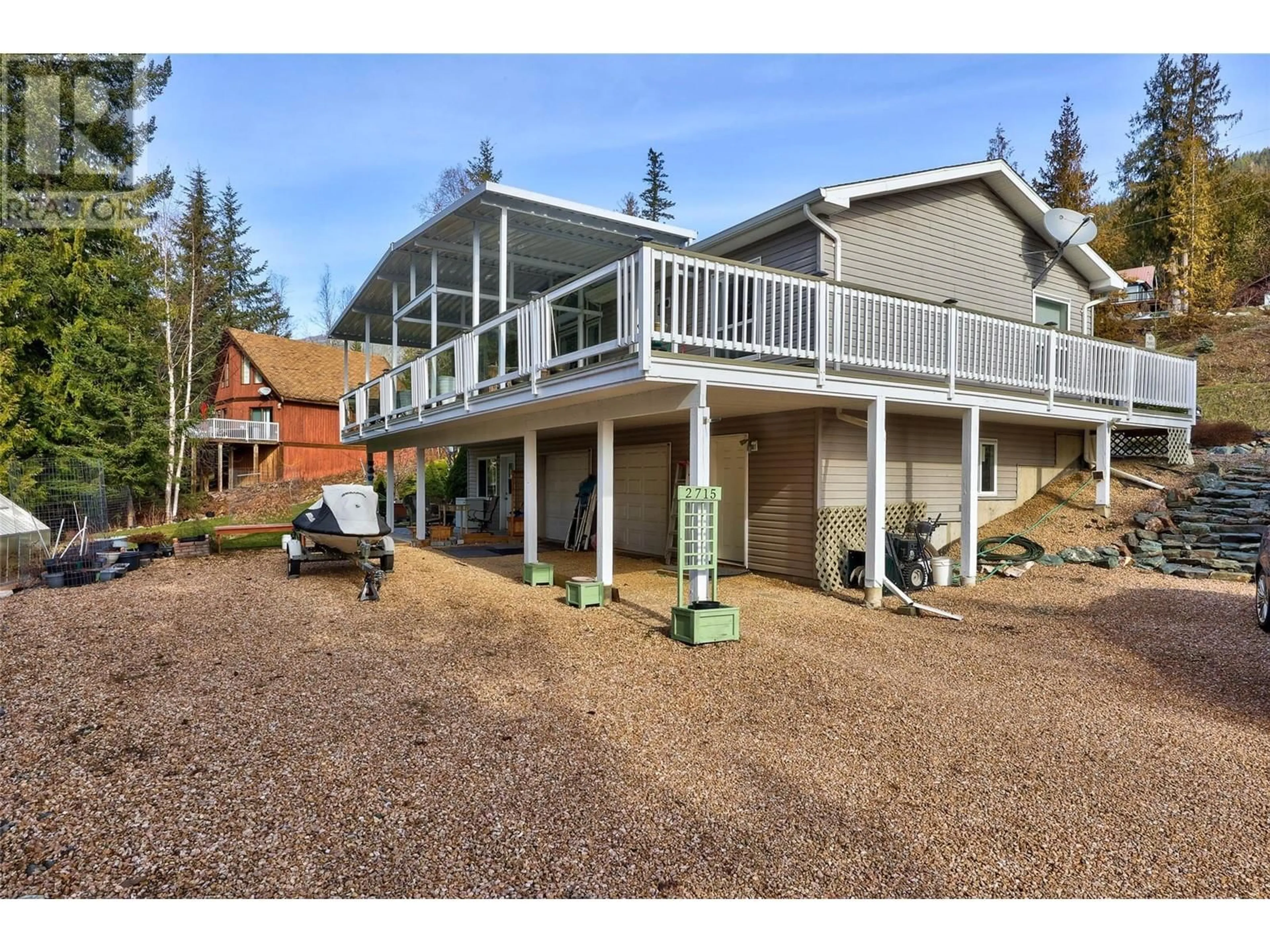 A pic from outside/outdoor area/front of a property/back of a property/a pic from drone, unknown for 2715 Fraser Road, Anglemont British Columbia V0E1M8