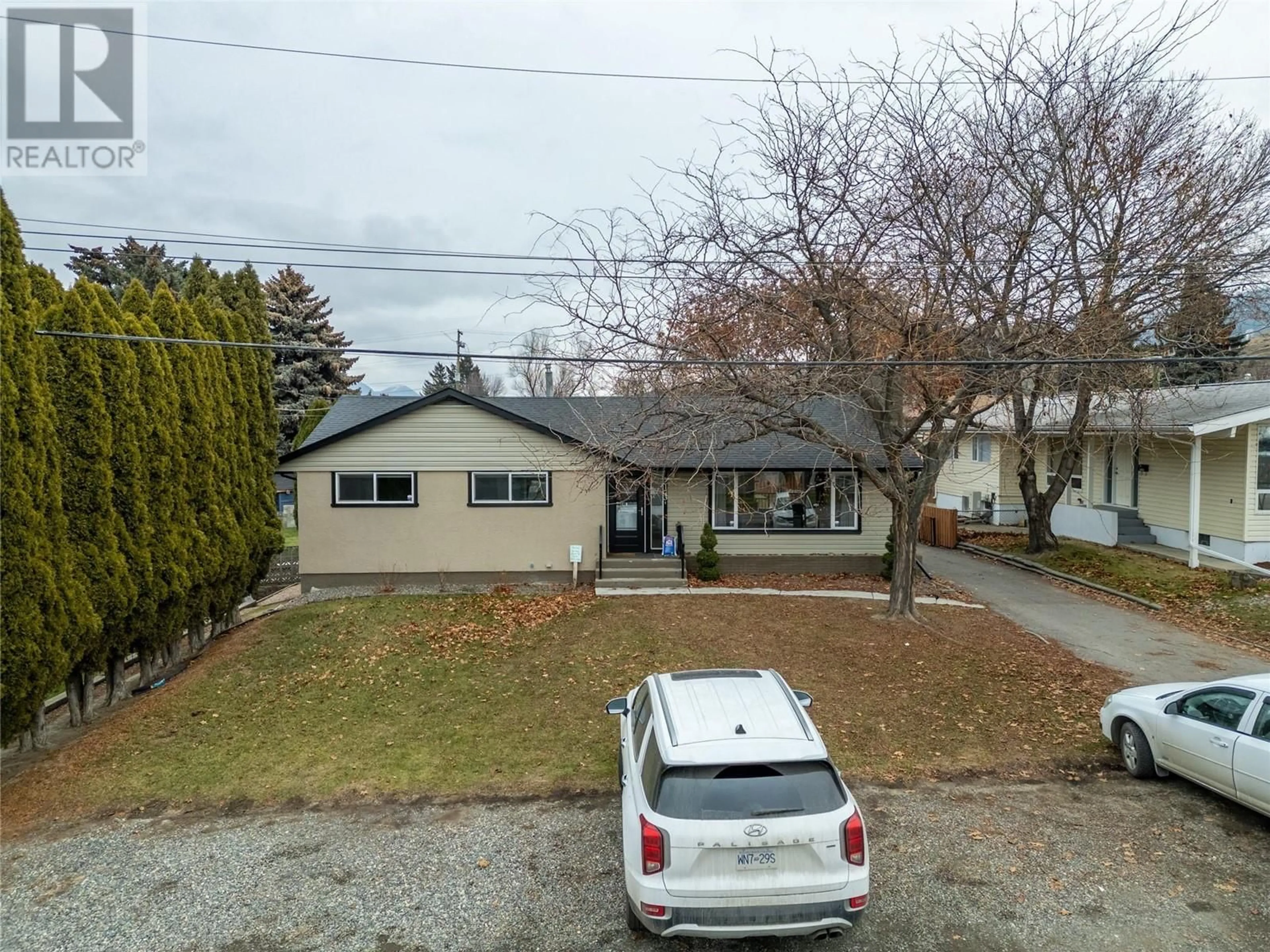 A pic from outside/outdoor area/front of a property/back of a property/a pic from drone, street for 173 KNOLLWOOD Drive, Kamloops British Columbia V2C4M5