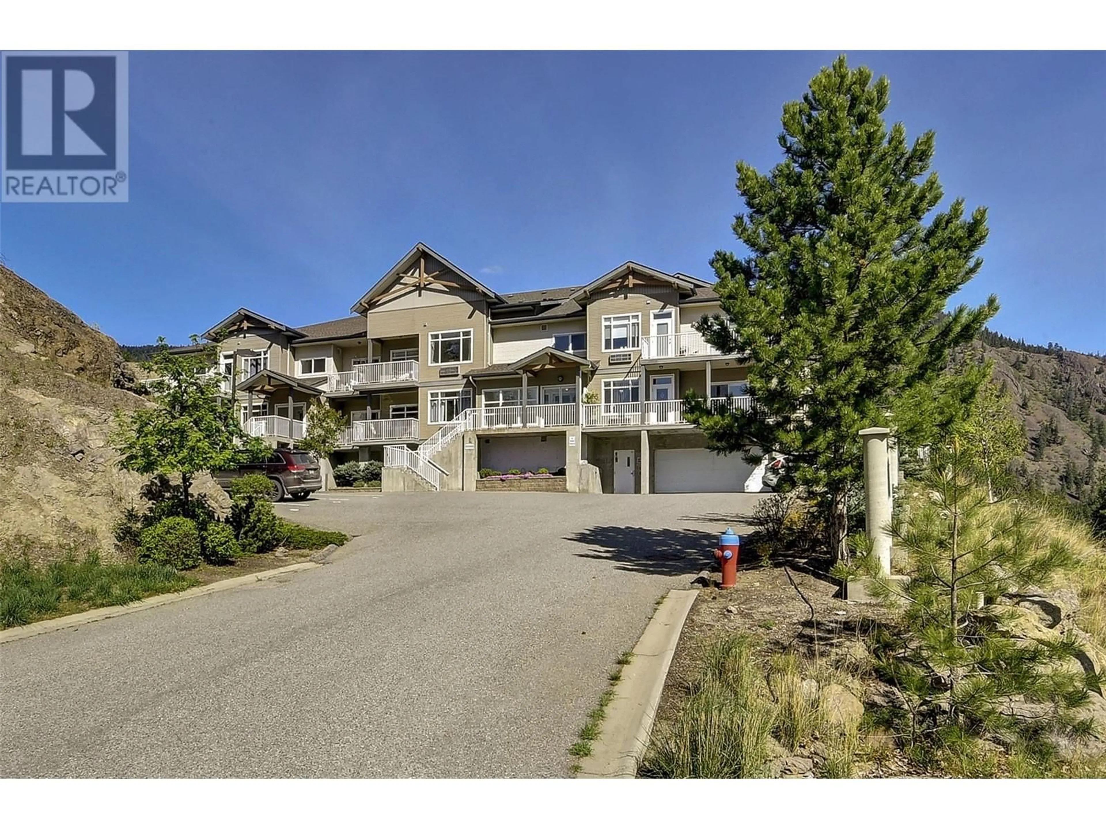 A pic from outside/outdoor area/front of a property/back of a property/a pic from drone, unknown for 2523 Shannon View Drive Unit# 106, West Kelowna British Columbia V4T2T3