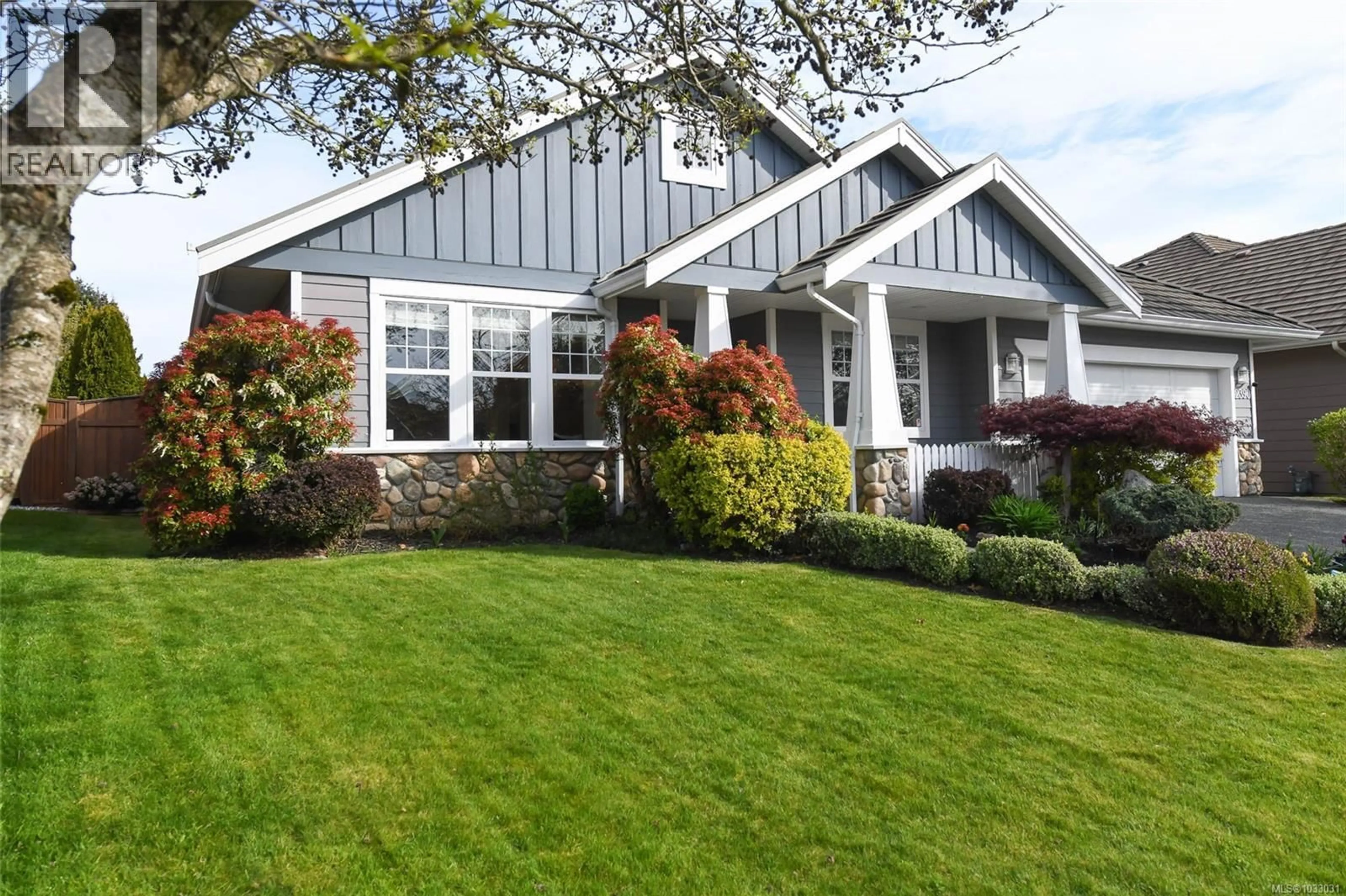 Home with vinyl exterior material, street for 2390 IDIENS WAY, Courtenay British Columbia V9N9J3