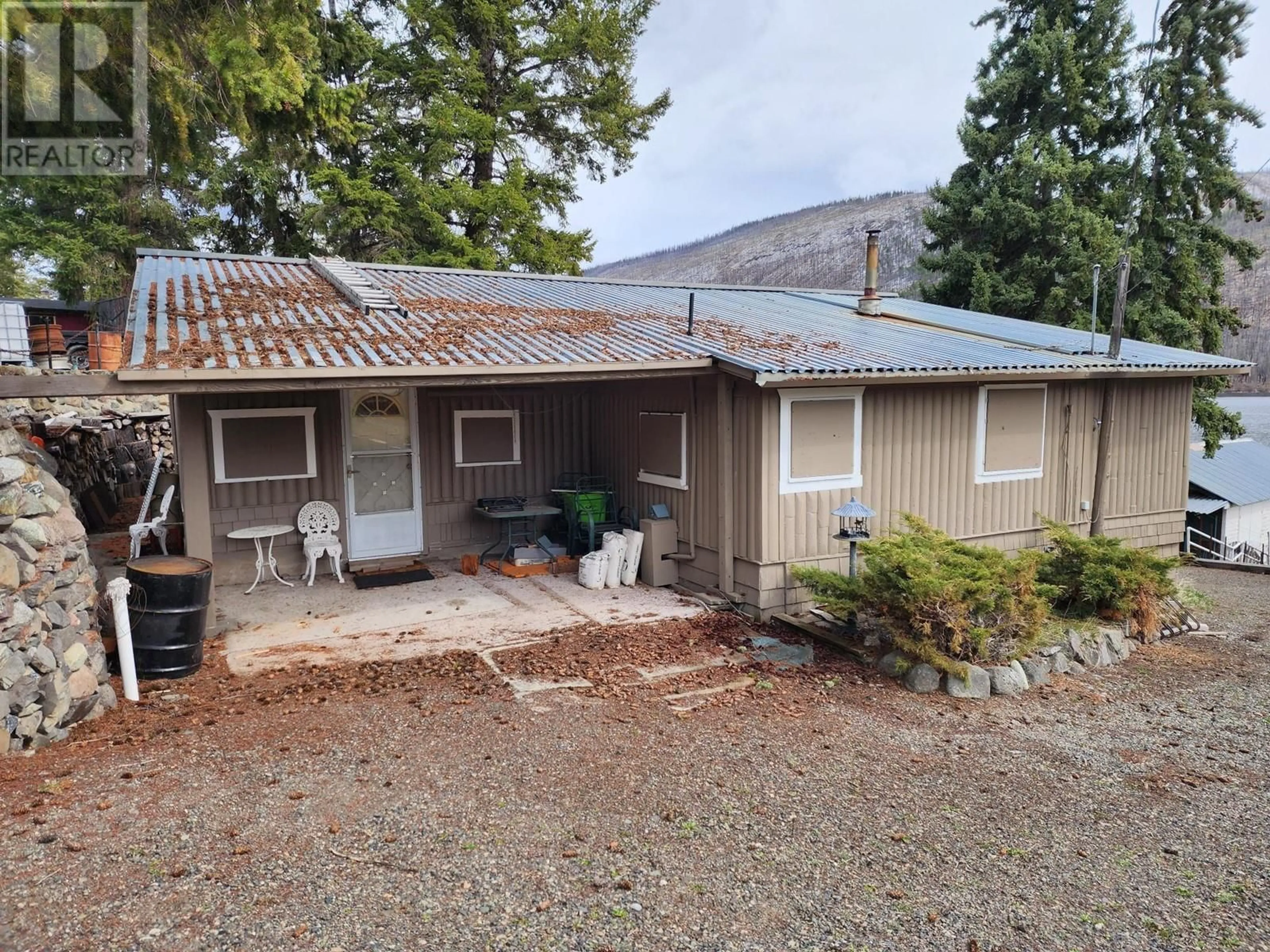A pic from outside/outdoor area/front of a property/back of a property/a pic from drone, street for 2424 LOON LAKE ROAD, Loon Lake British Columbia V0K1H1