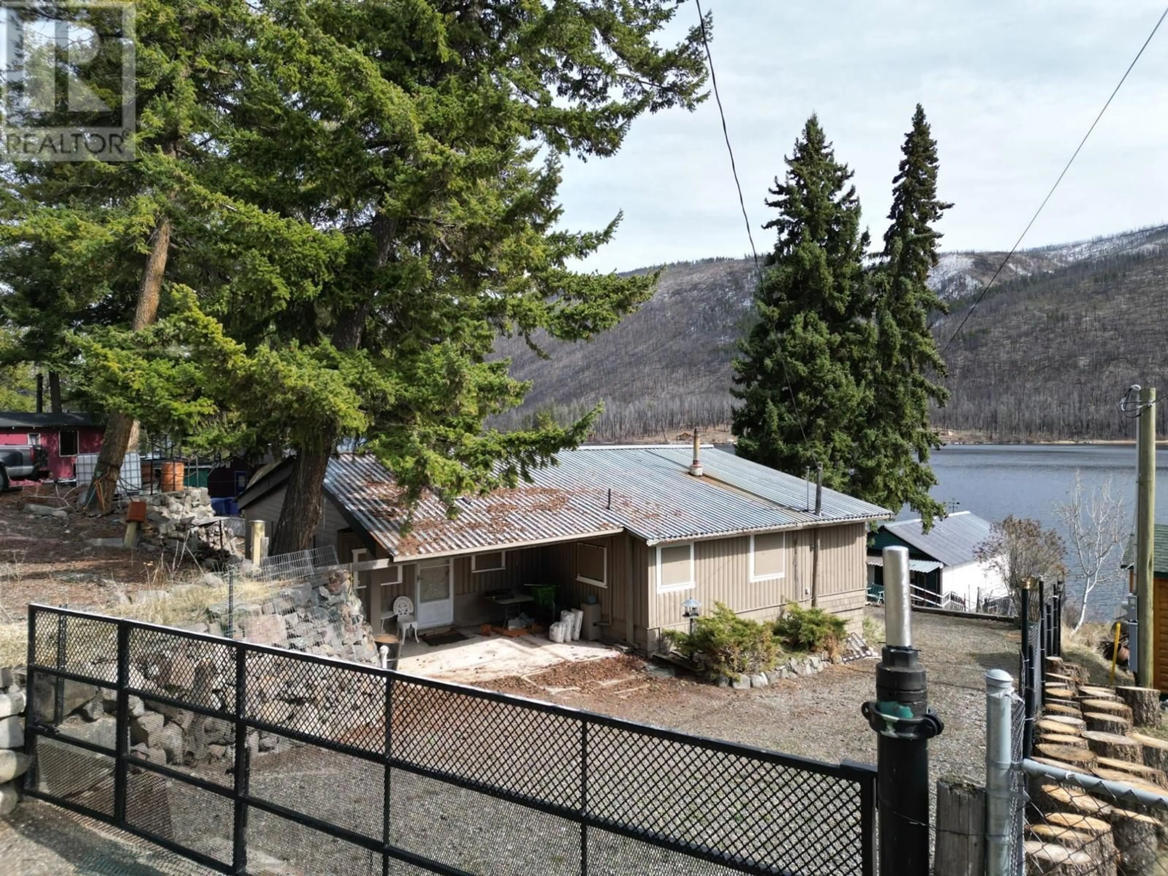 A pic from outside/outdoor area/front of a property/back of a property/a pic from drone, water/lake/river/ocean view for 2424 LOON LAKE ROAD, Loon Lake British Columbia V0K1H1