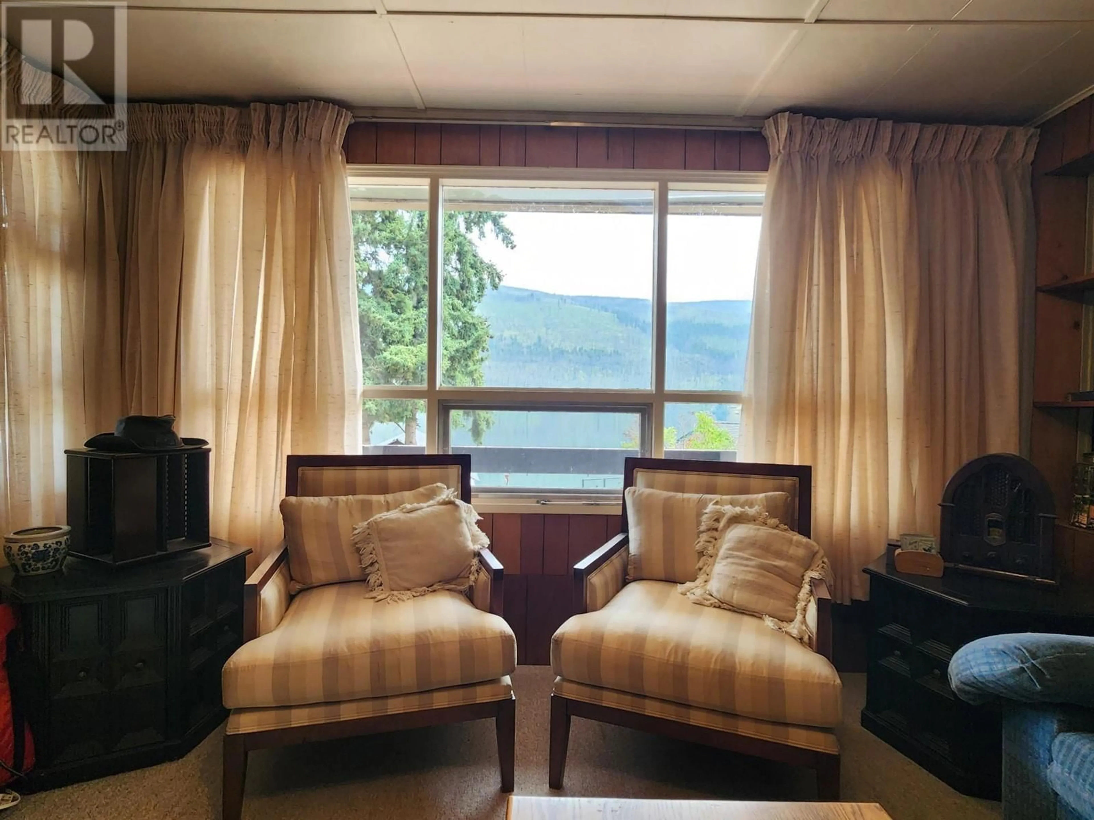 Living room with furniture, wood/laminate floor for 2424 LOON LAKE ROAD, Loon Lake British Columbia V0K1H1