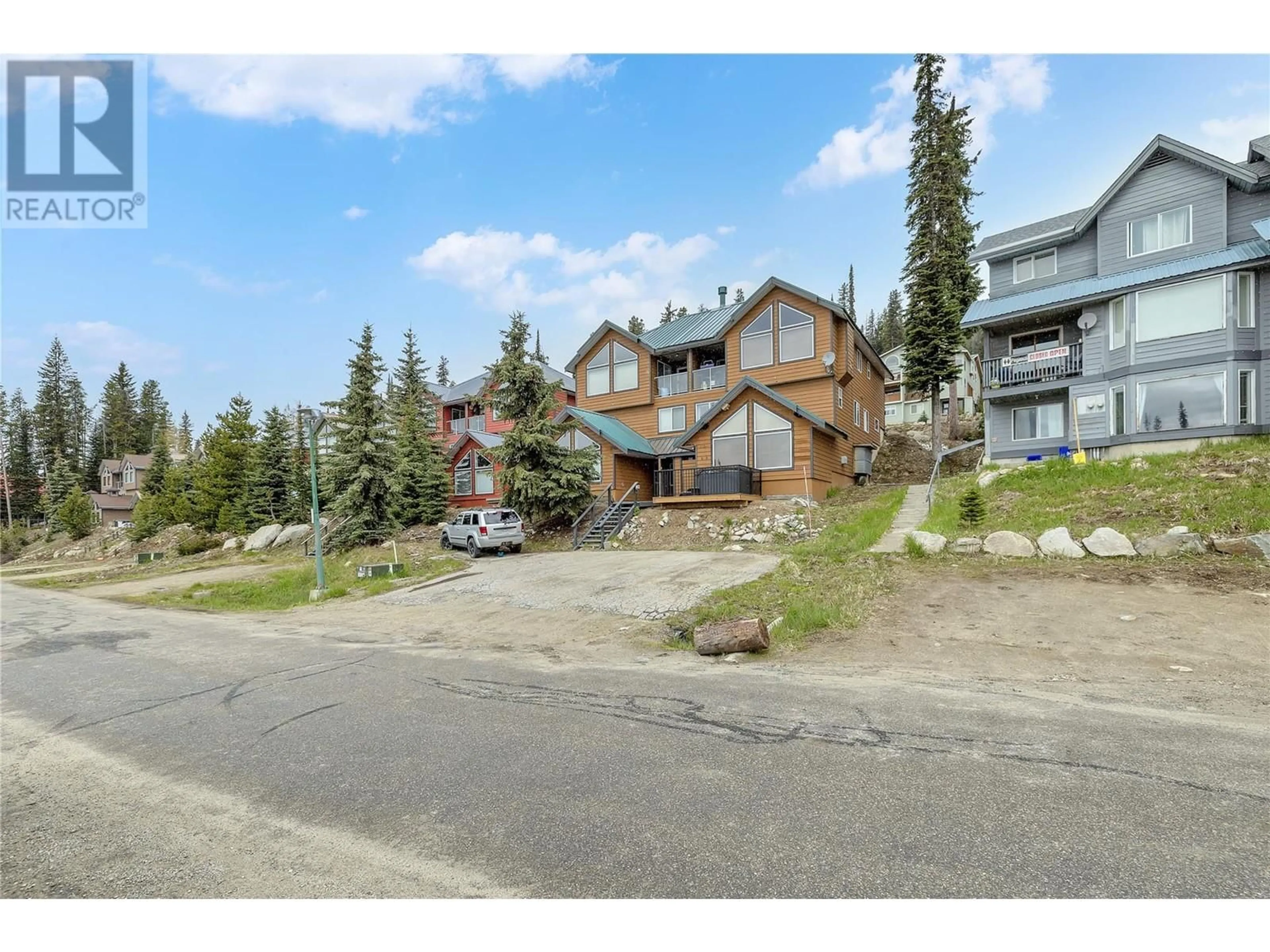 A pic from outside/outdoor area/front of a property/back of a property/a pic from drone, mountain view for 5965 D SNOWPINES CRESCENT, Big White British Columbia V1P1P3