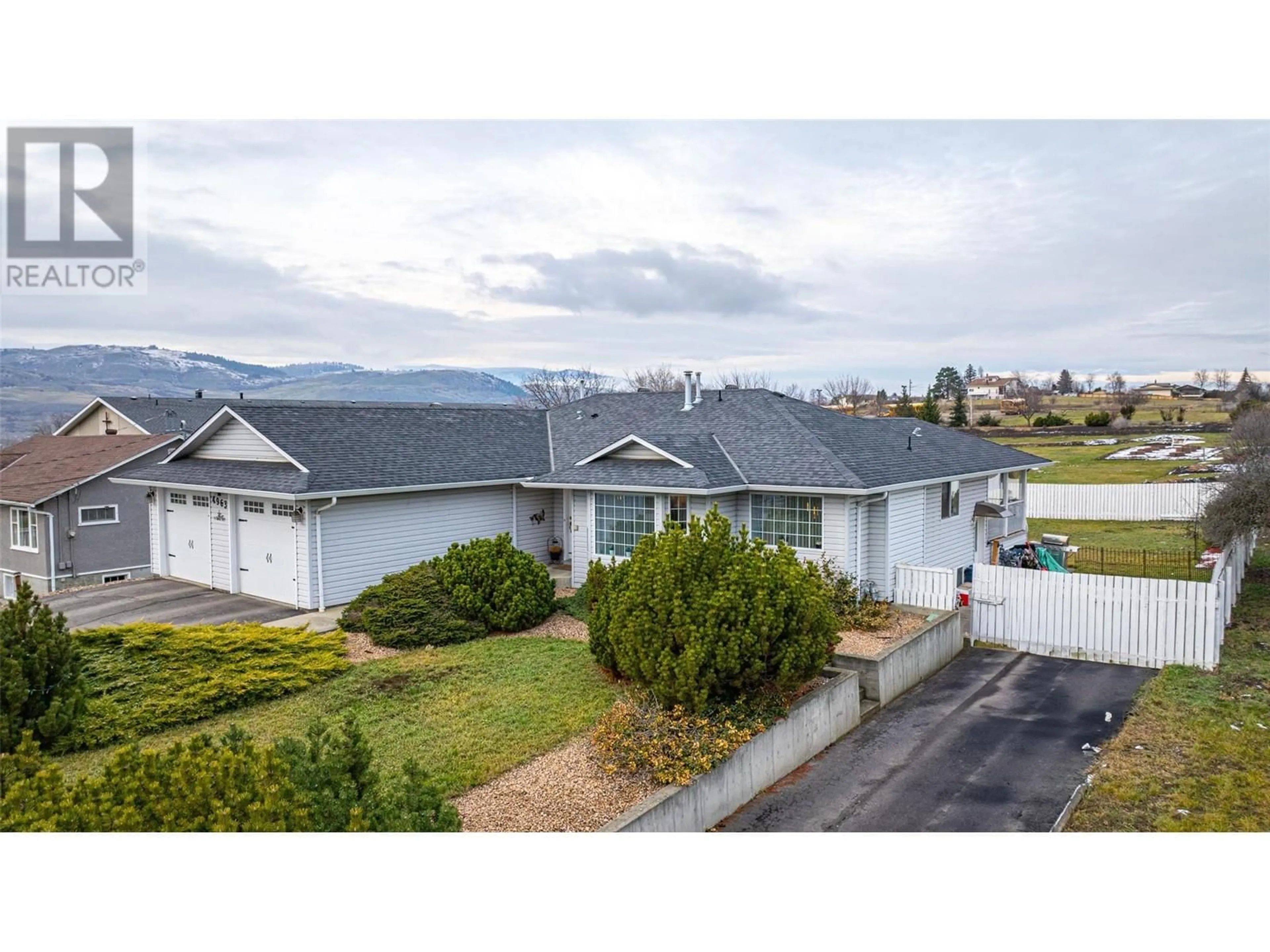 A pic from outside/outdoor area/front of a property/back of a property/a pic from drone, mountain view for 4963 Silver Star Road, Vernon British Columbia V1B3K3