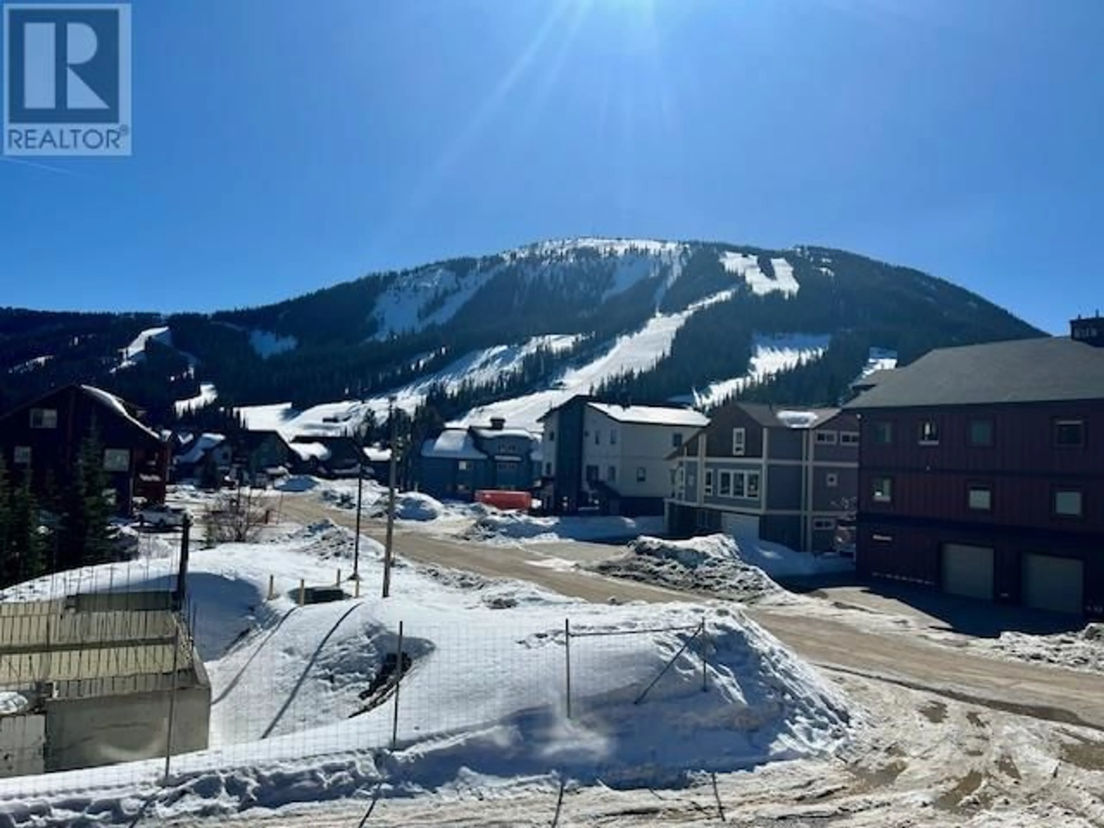 A pic from outside/outdoor area/front of a property/back of a property/a pic from drone, mountain view for 161 Clearview Crescent Unit# 203, Apex Mountain British Columbia V0X1K0