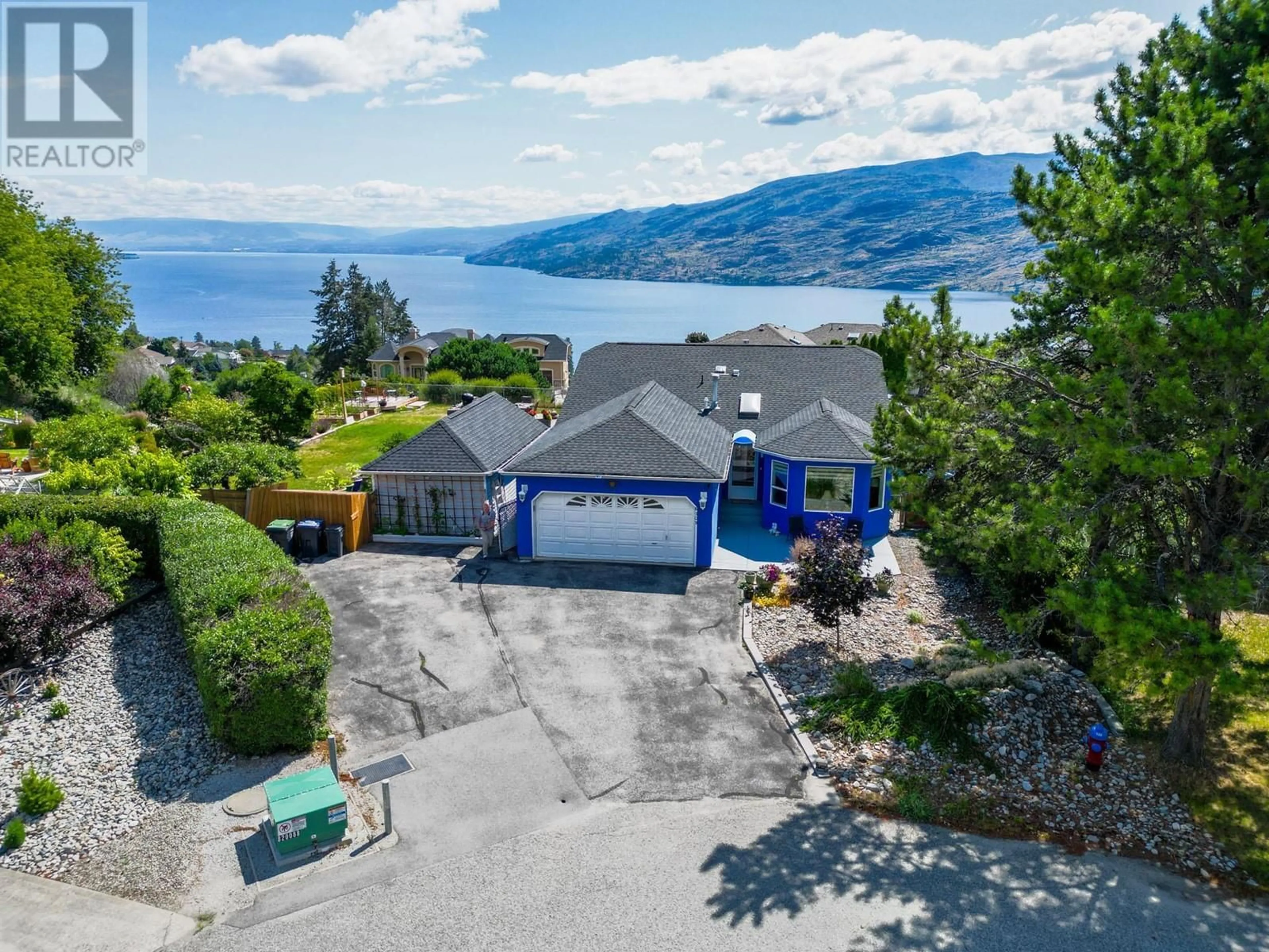 A pic from outside/outdoor area/front of a property/back of a property/a pic from drone, water/lake/river/ocean view for 6109 Thwaite Crescent, Peachland British Columbia V0H1X4