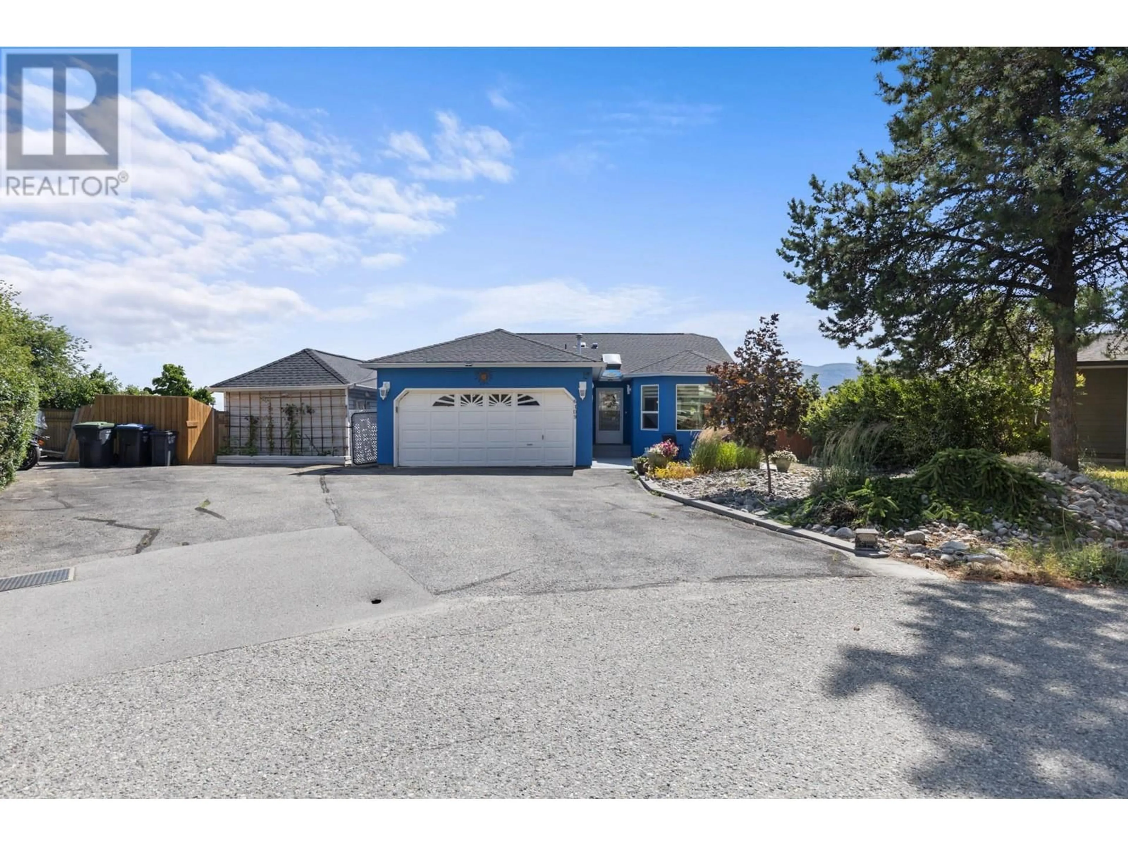 A pic from outside/outdoor area/front of a property/back of a property/a pic from drone, street for 6109 Thwaite Crescent, Peachland British Columbia V0H1X4