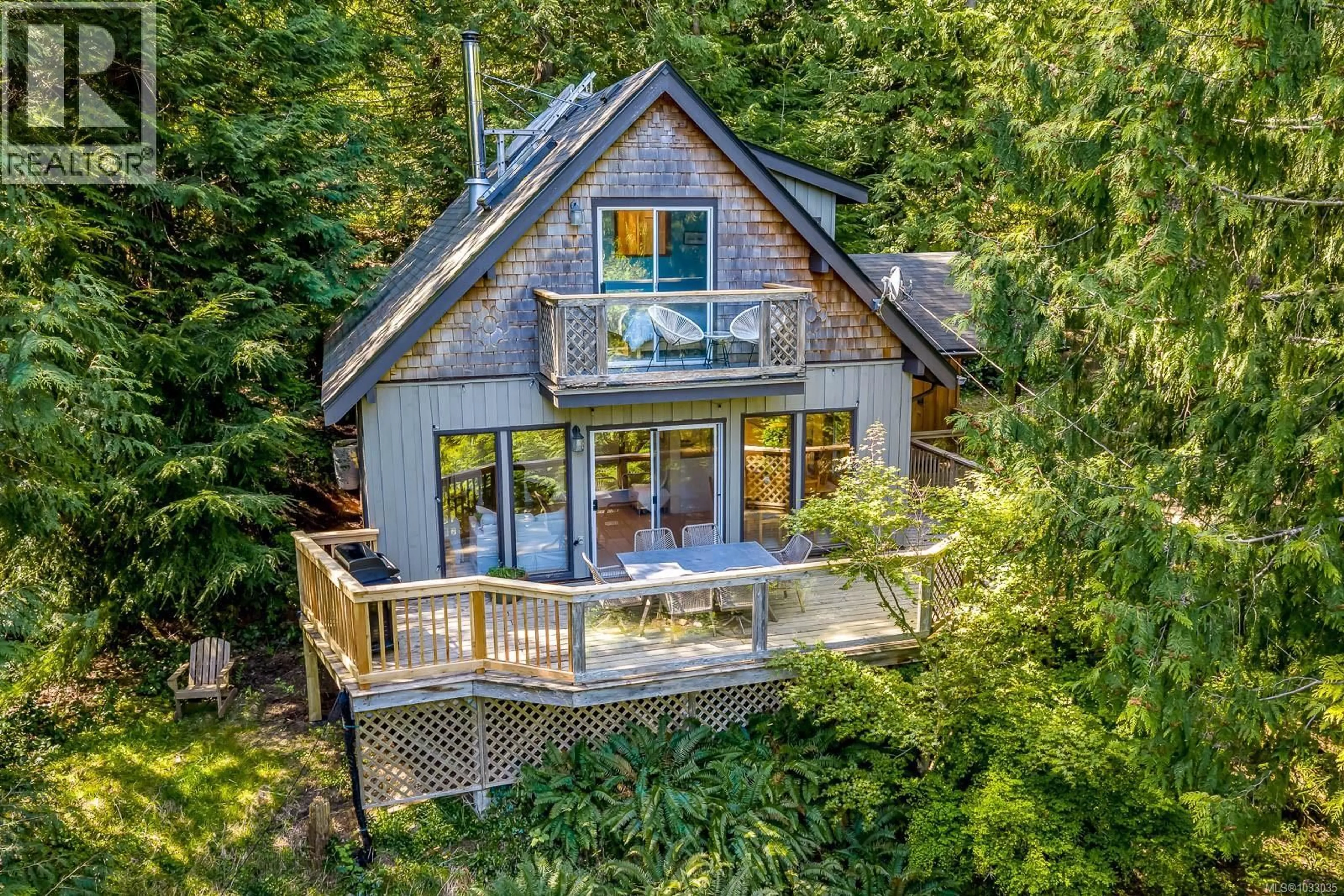A pic from outside/outdoor area/front of a property/back of a property/a pic from drone, water/lake/river/ocean view for 833 AUSTIN DRIVE, Cortes Island British Columbia V0P1K0