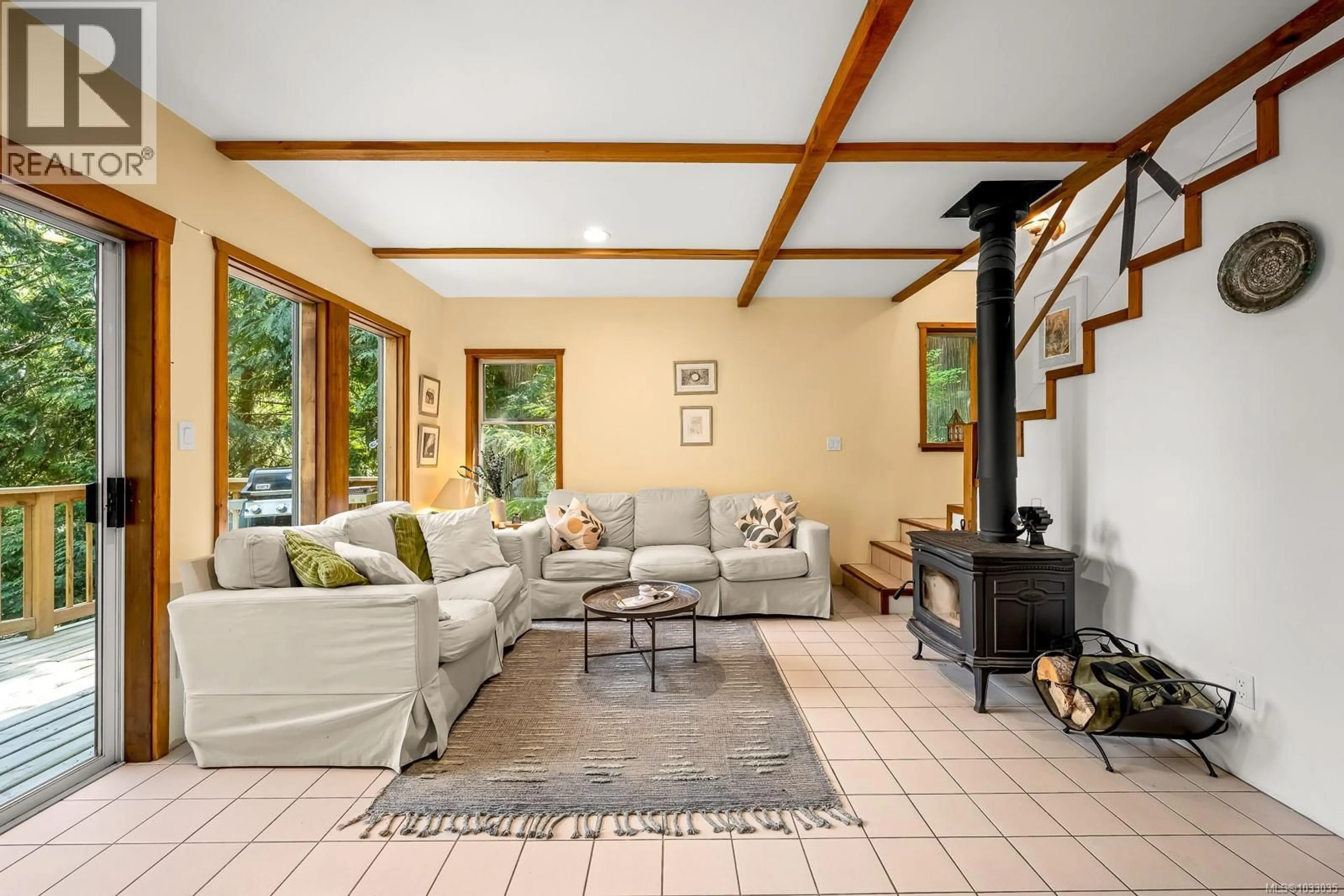 Living room with furniture, ceramic/tile floor for 833 AUSTIN DRIVE, Cortes Island British Columbia V0P1K0