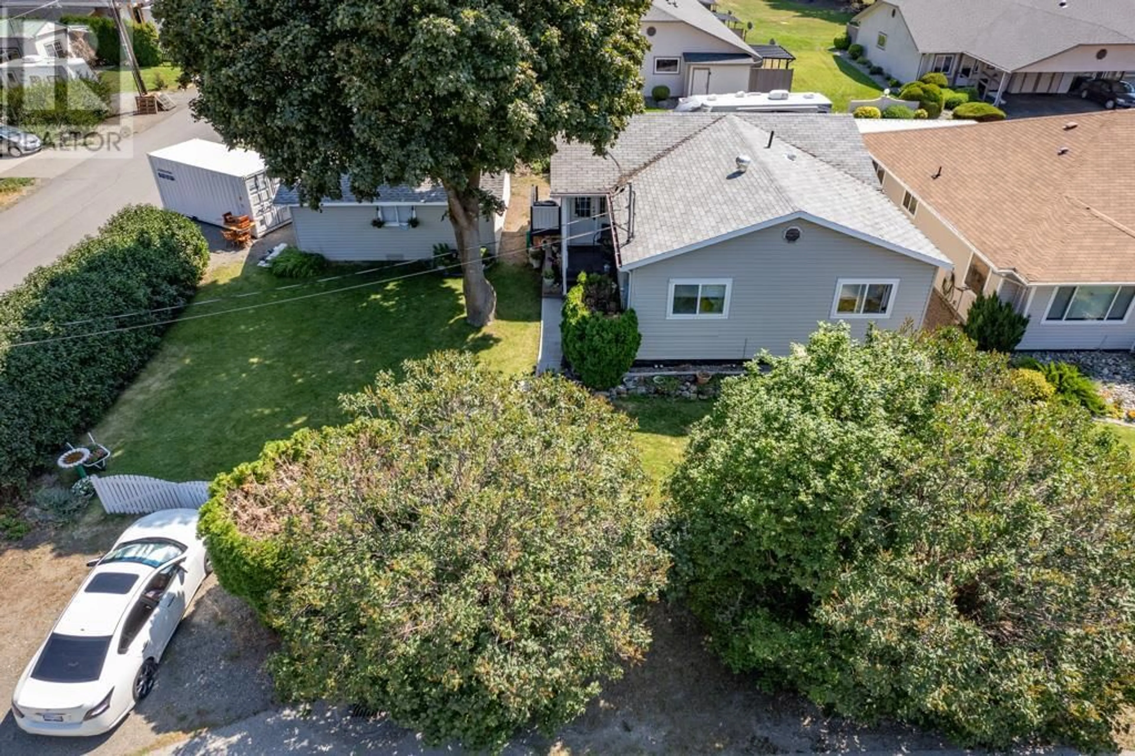 A pic from outside/outdoor area/front of a property/back of a property/a pic from drone, street for 1103 8th Street, Keremeos British Columbia V0X1N3