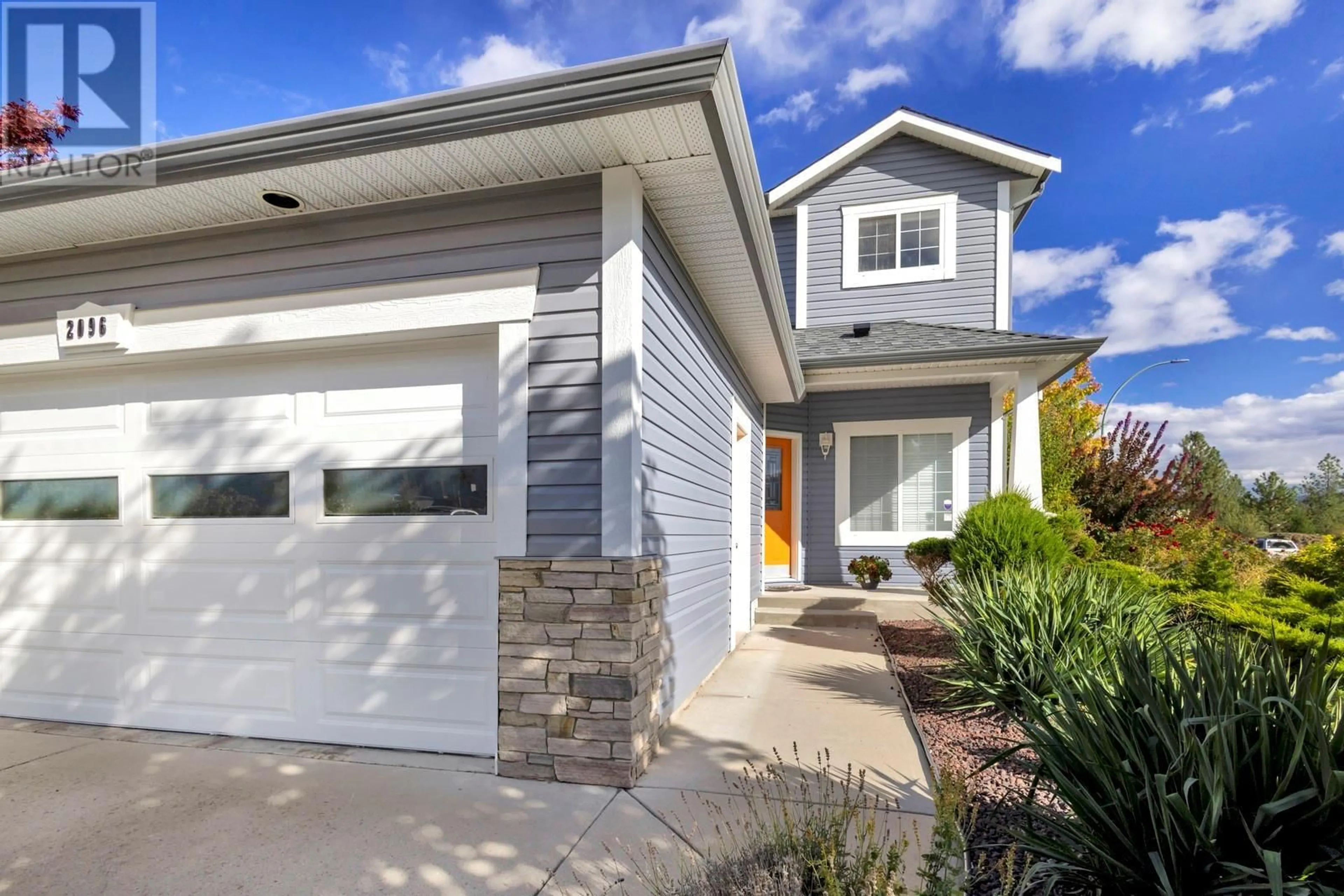 Home with vinyl exterior material, street for 2096 Rosefield Drive, West Kelowna British Columbia V1Z3Y8