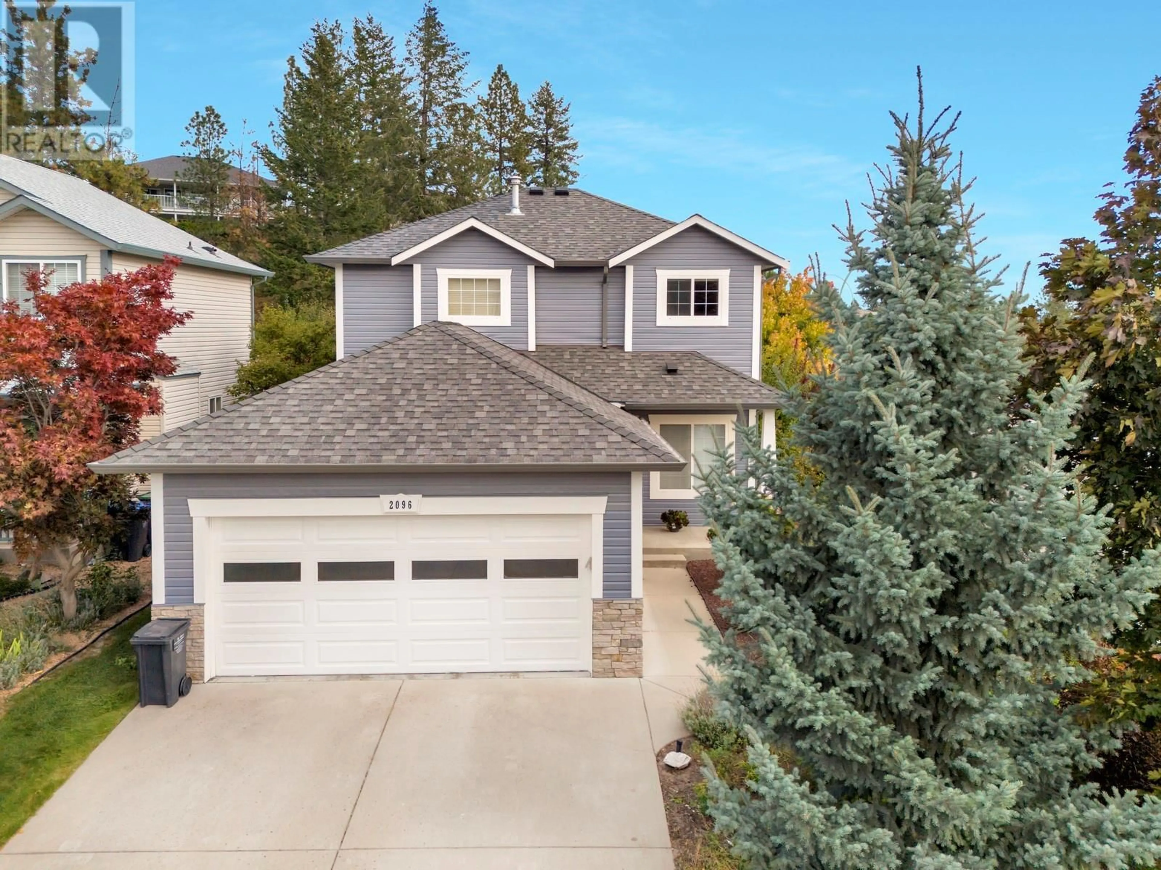 A pic from outside/outdoor area/front of a property/back of a property/a pic from drone, street for 2096 Rosefield Drive, West Kelowna British Columbia V1Z3Y8