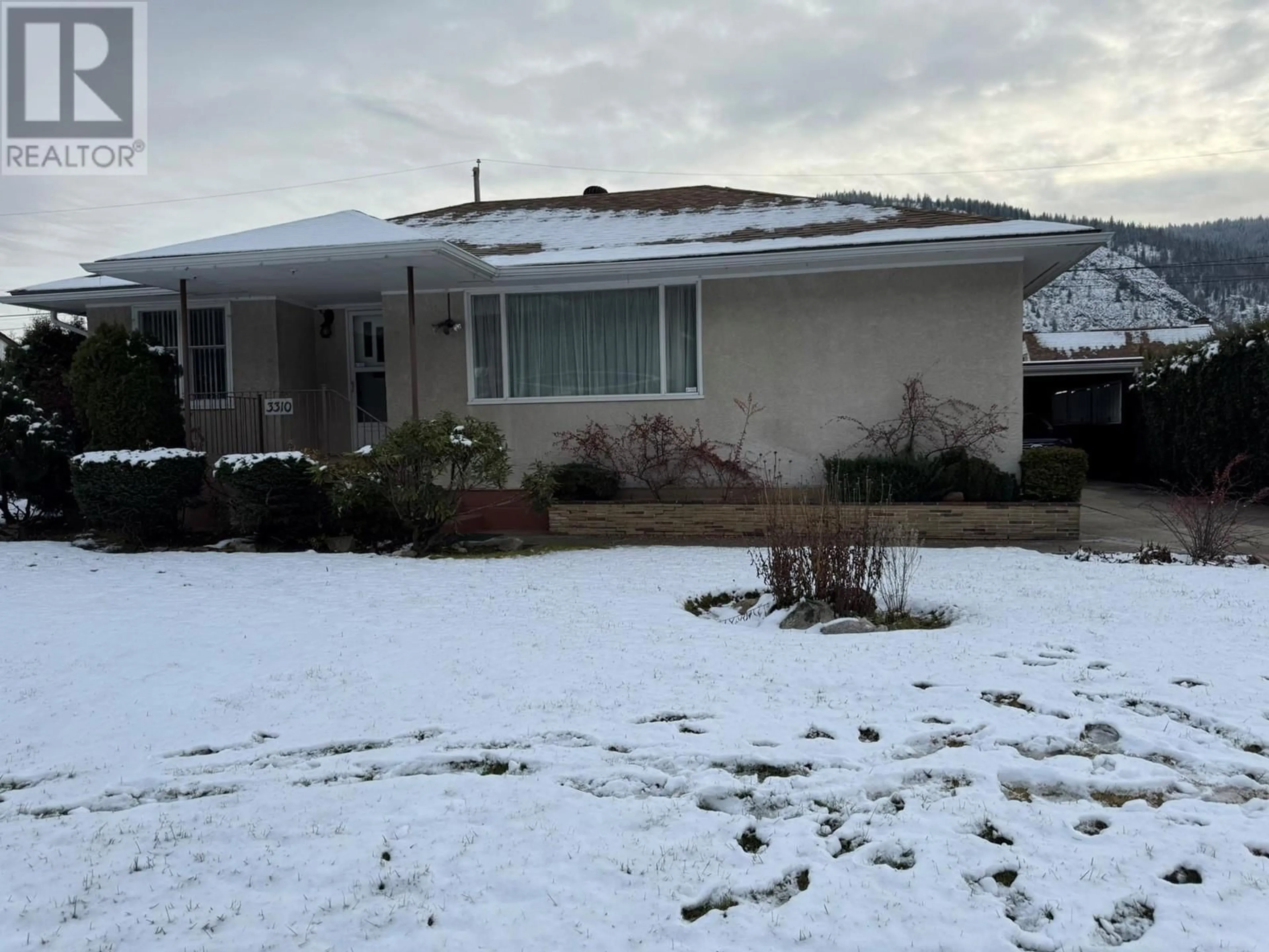 A pic from outside/outdoor area/front of a property/back of a property/a pic from drone, street for 3310 LILAC Crescent, Trail British Columbia V1R1Y2