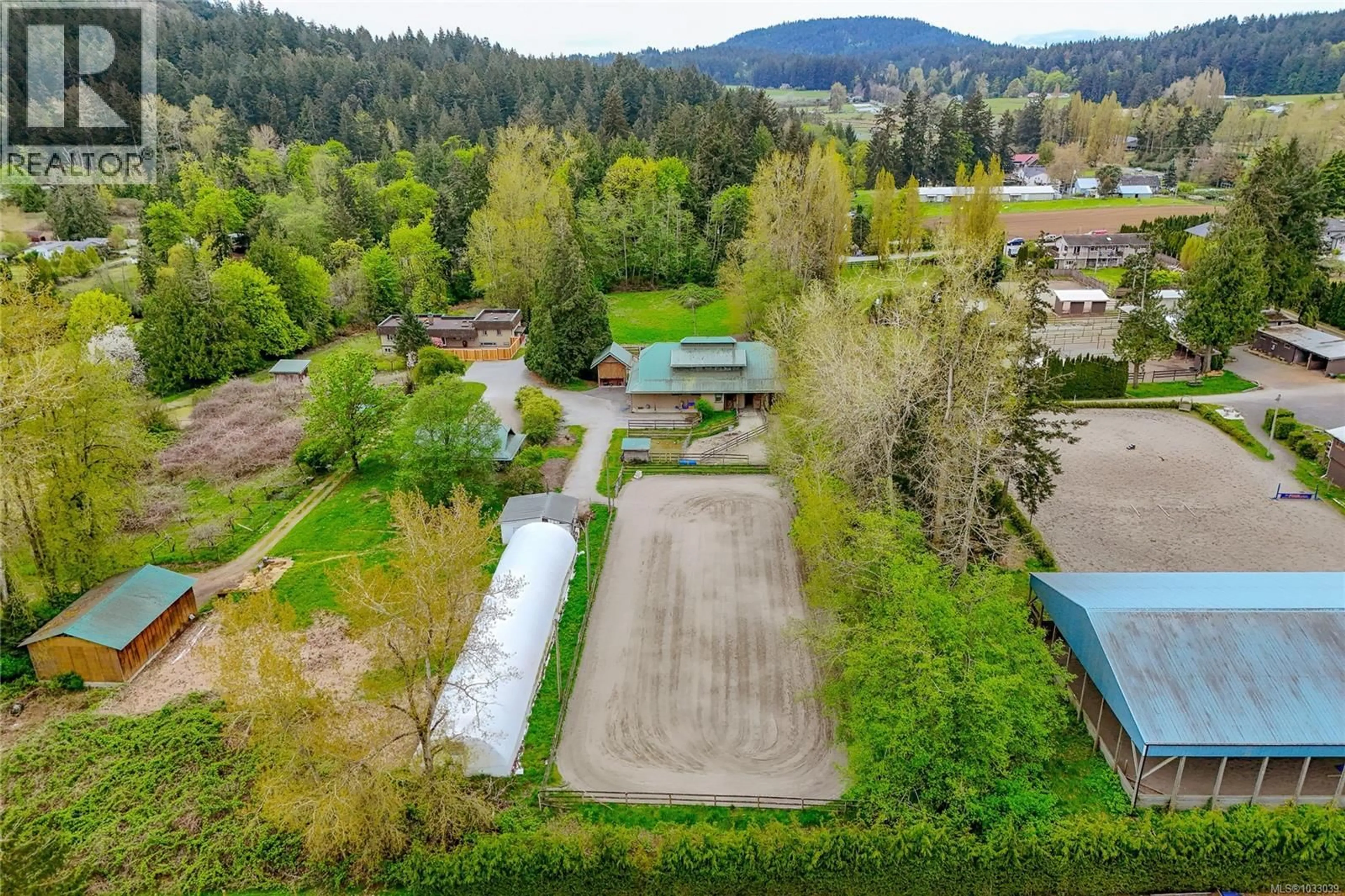 A pic from outside/outdoor area/front of a property/back of a property/a pic from drone, unknown for 2080 BEAR HILL ROAD, Central Saanich British Columbia V8X1M7