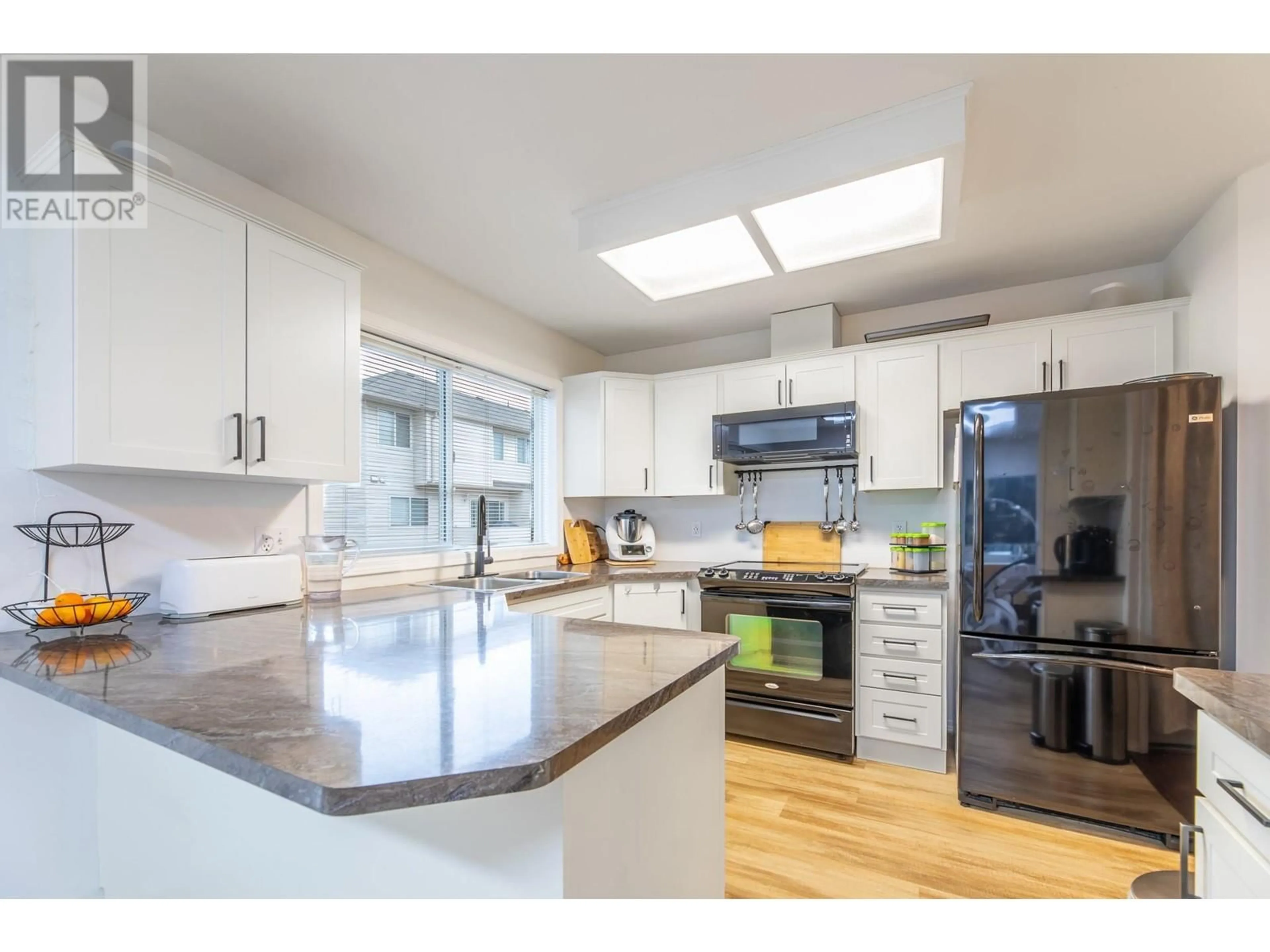 Open concept kitchen, unknown for 3153 Paris Street, Penticton British Columbia V2A8P1