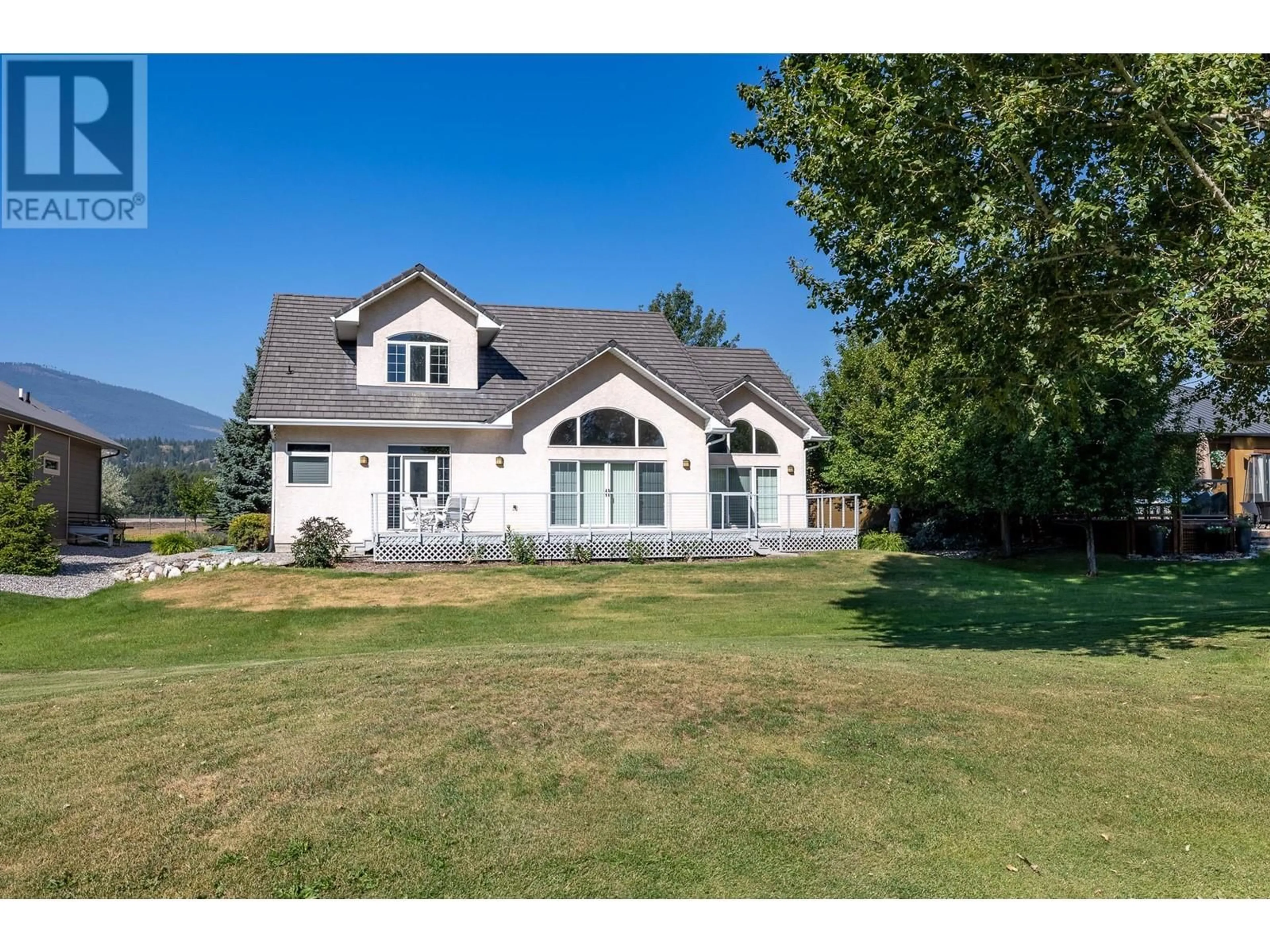 A pic from outside/outdoor area/front of a property/back of a property/a pic from drone, mountain view for 5214 RIVERSIDE Drive, Fairmont Hot Springs British Columbia V0A1L1