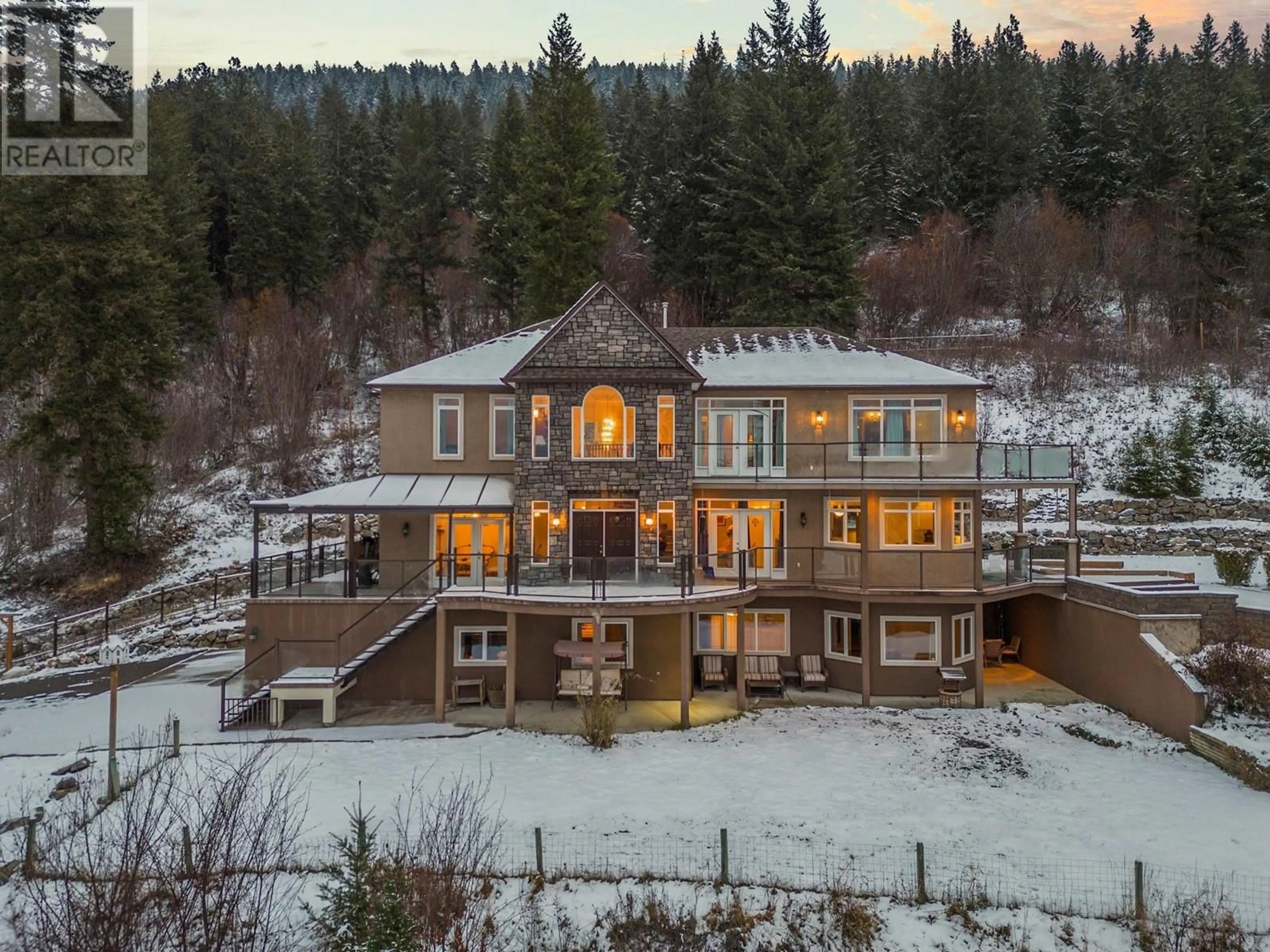 A pic from outside/outdoor area/front of a property/back of a property/a pic from drone, unknown for 5475/5477 Kingsview Road, Vernon British Columbia V1B3J5