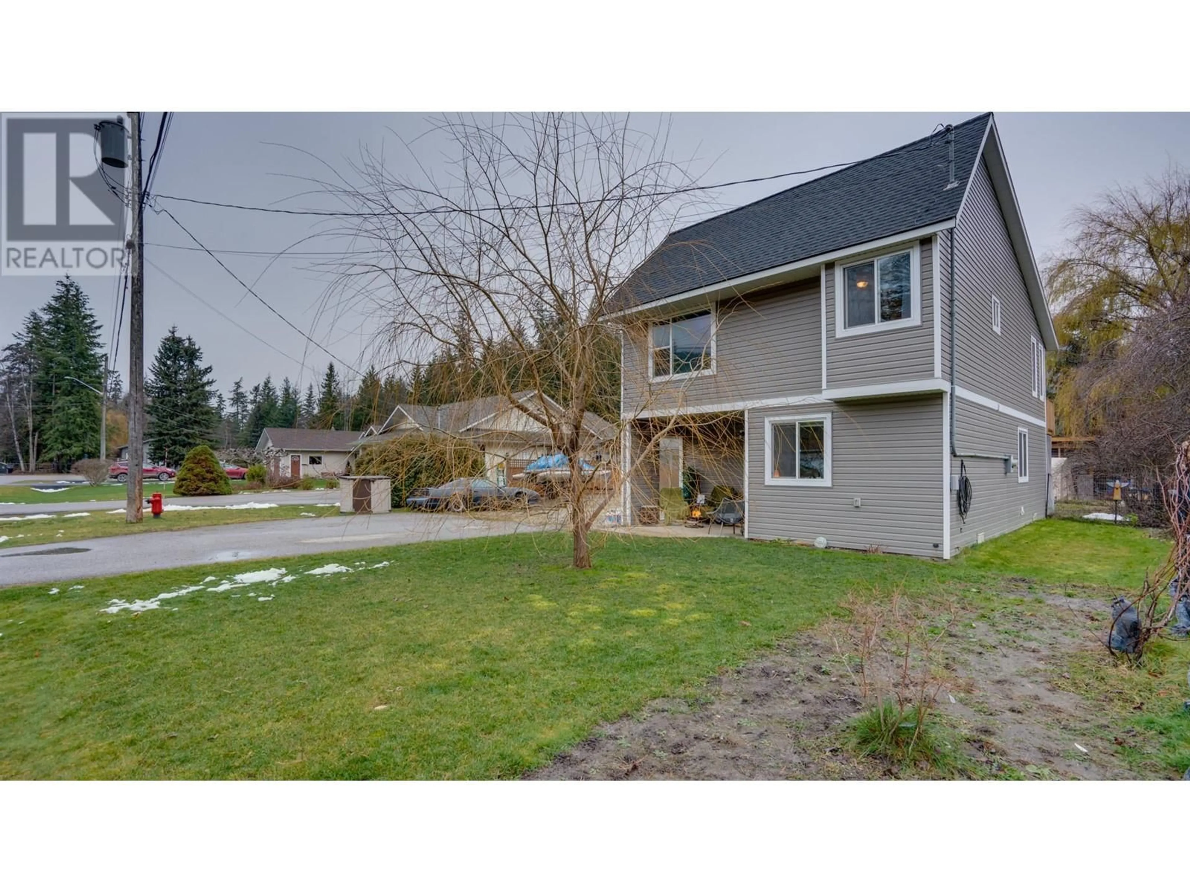 A pic from outside/outdoor area/front of a property/back of a property/a pic from drone, street for 434 Maduik Avenue, Sicamous British Columbia V0E2V1