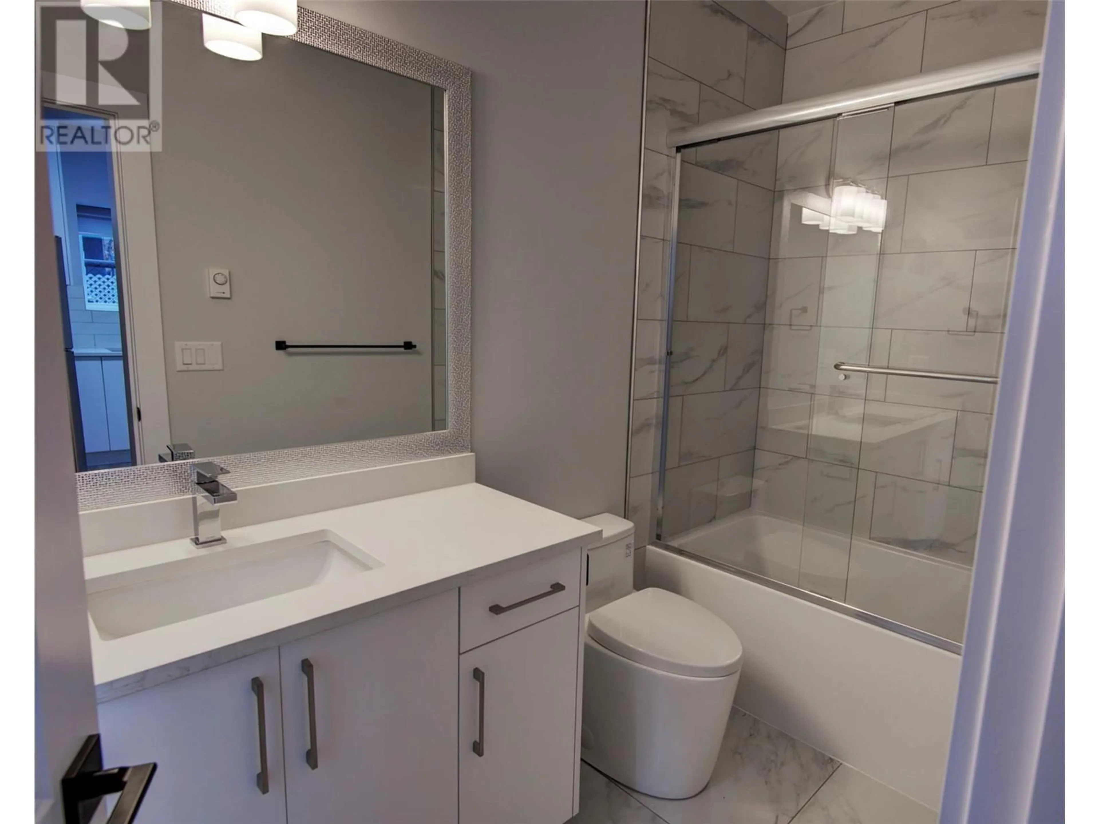 Standard bathroom, ceramic/tile floor for 2206 32 Street Unit# A, Vernon British Columbia V1T5L3