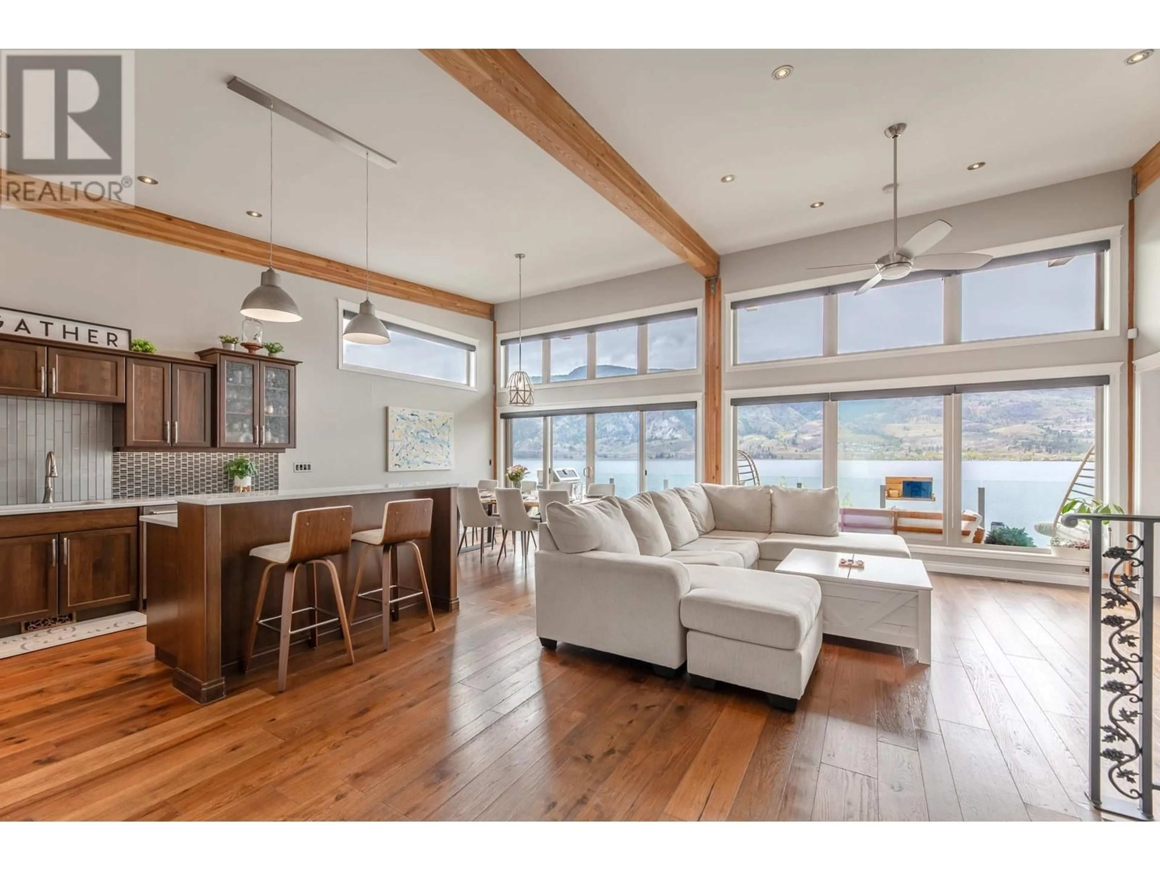 Living room with furniture, wood/laminate floor for 4009 LAKESIDE Road, Penticton British Columbia V2A8W3