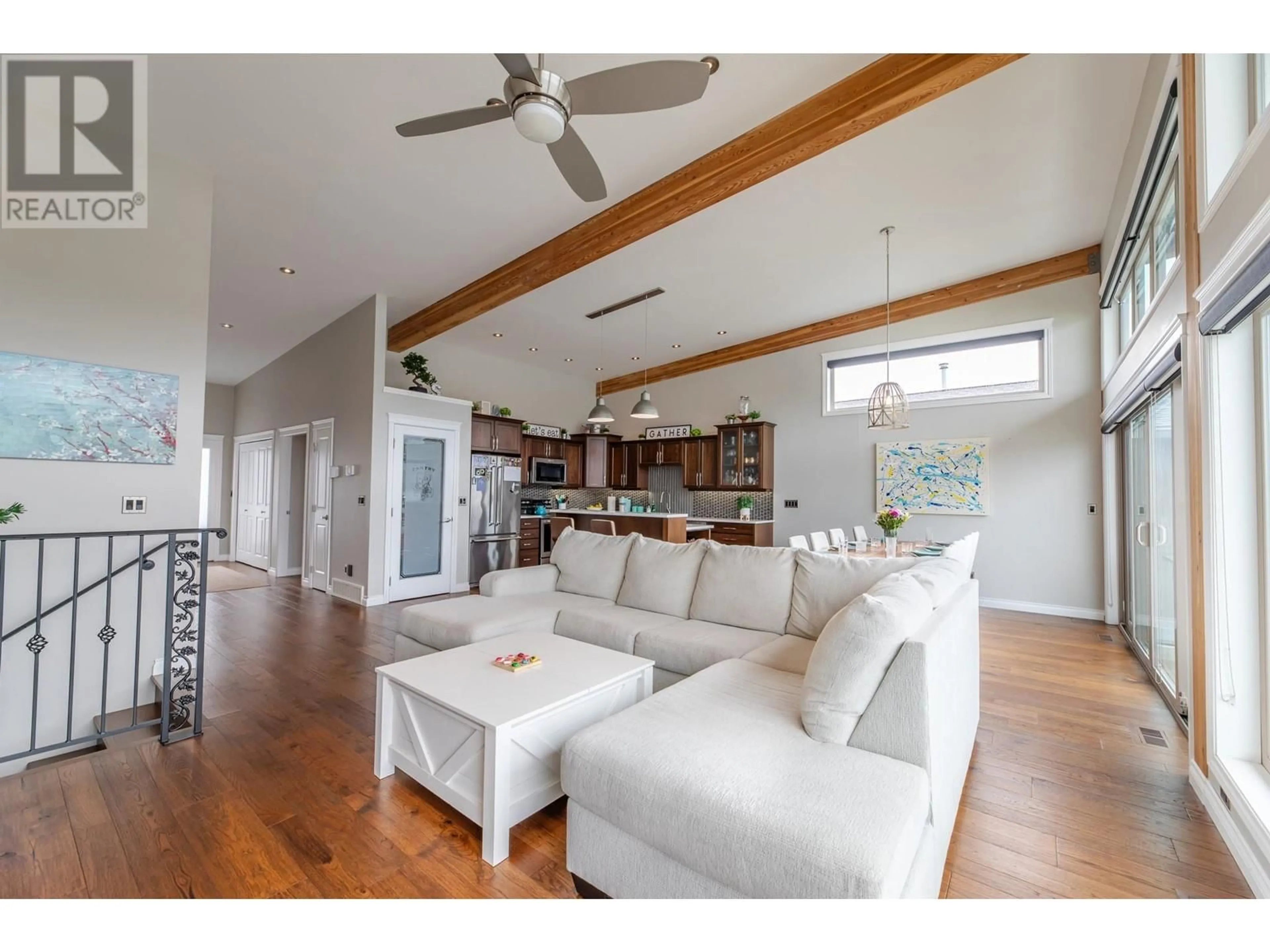 Living room with furniture, wood/laminate floor for 4009 LAKESIDE Road, Penticton British Columbia V2A8W3