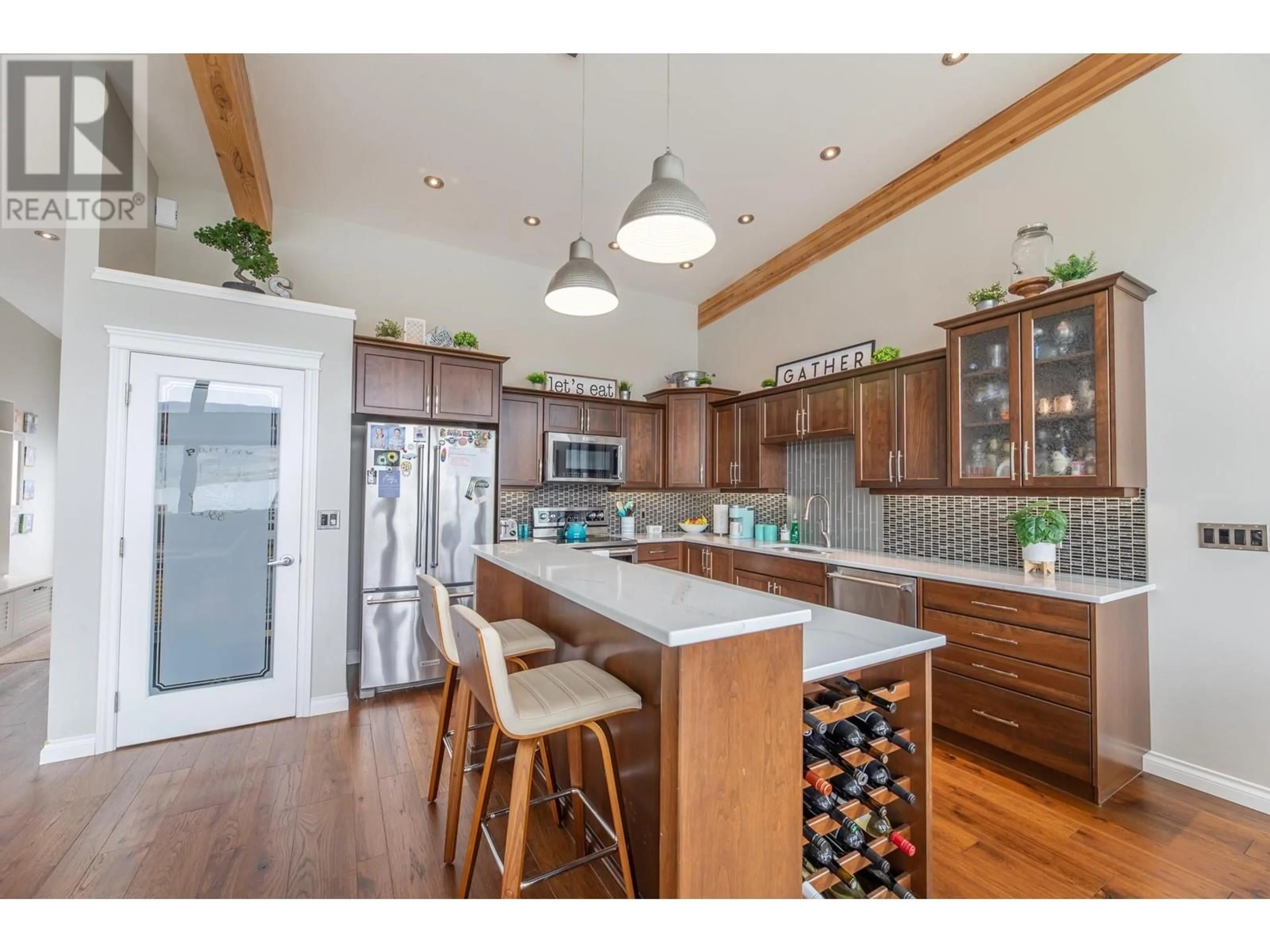 Open concept kitchen, wood/laminate floor for 4009 LAKESIDE Road, Penticton British Columbia V2A8W3