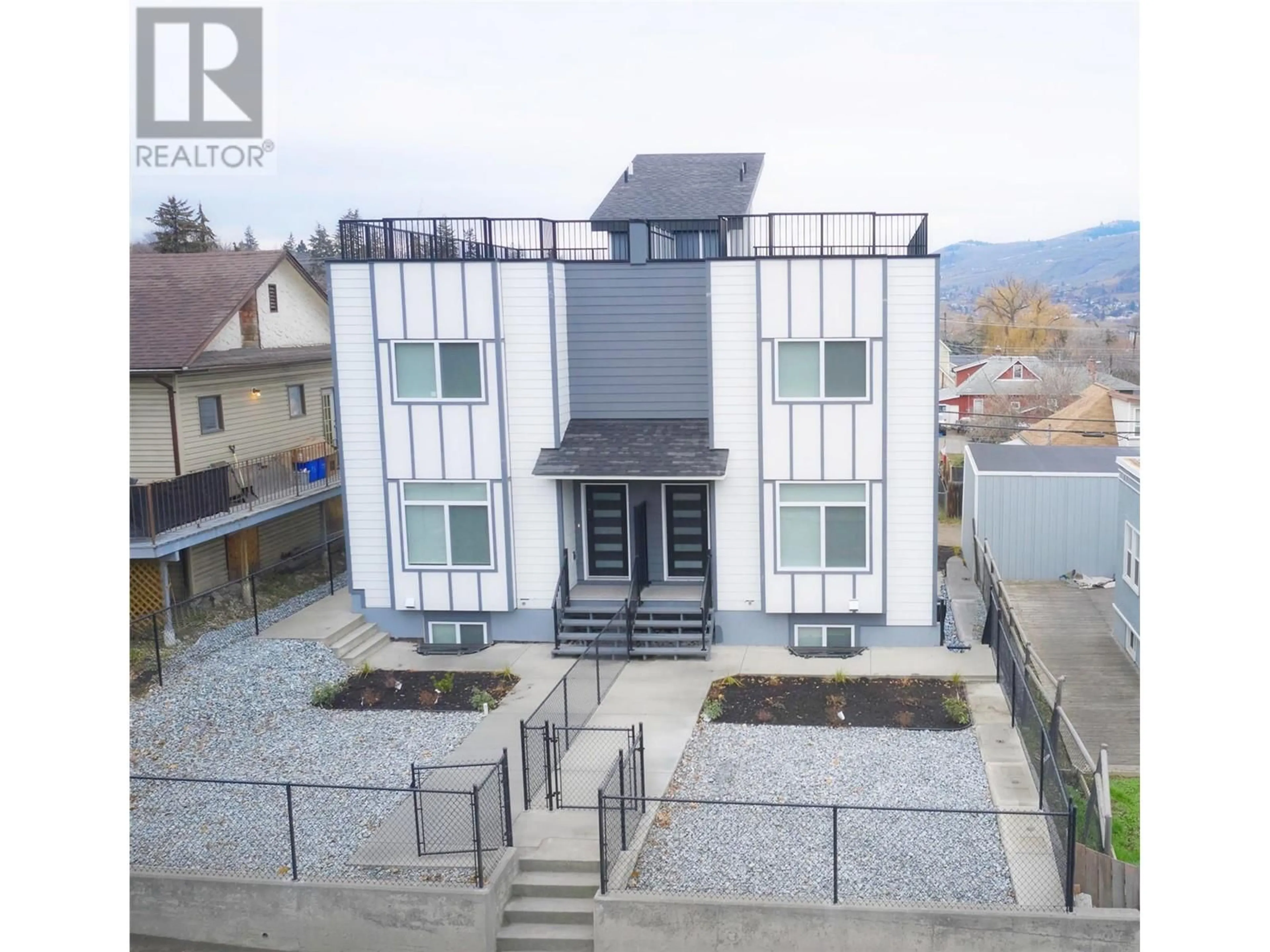 A pic from outside/outdoor area/front of a property/back of a property/a pic from drone, water/lake/river/ocean view for 2206 32 Street Unit# B, Vernon British Columbia V1T5L3