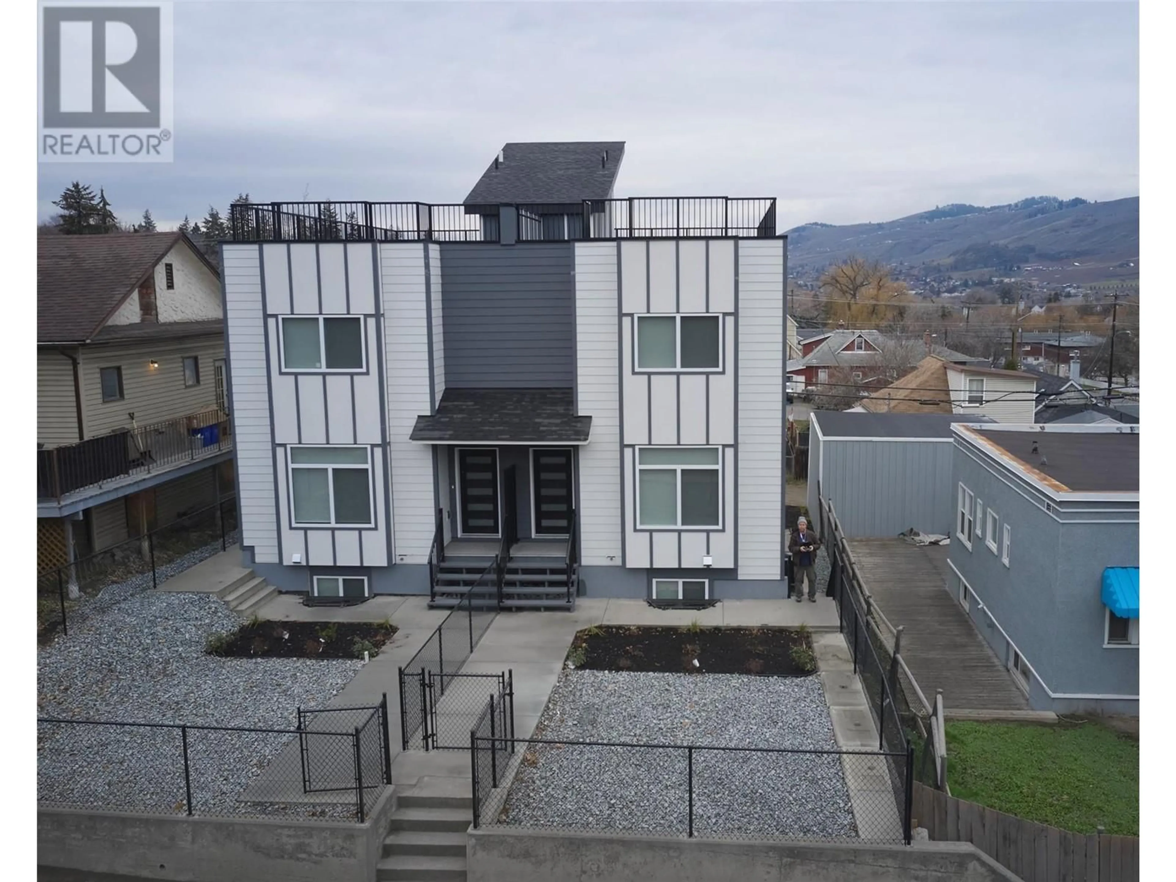 A pic from outside/outdoor area/front of a property/back of a property/a pic from drone, unknown for 2206 32 Street Unit# B, Vernon British Columbia V1T5L3