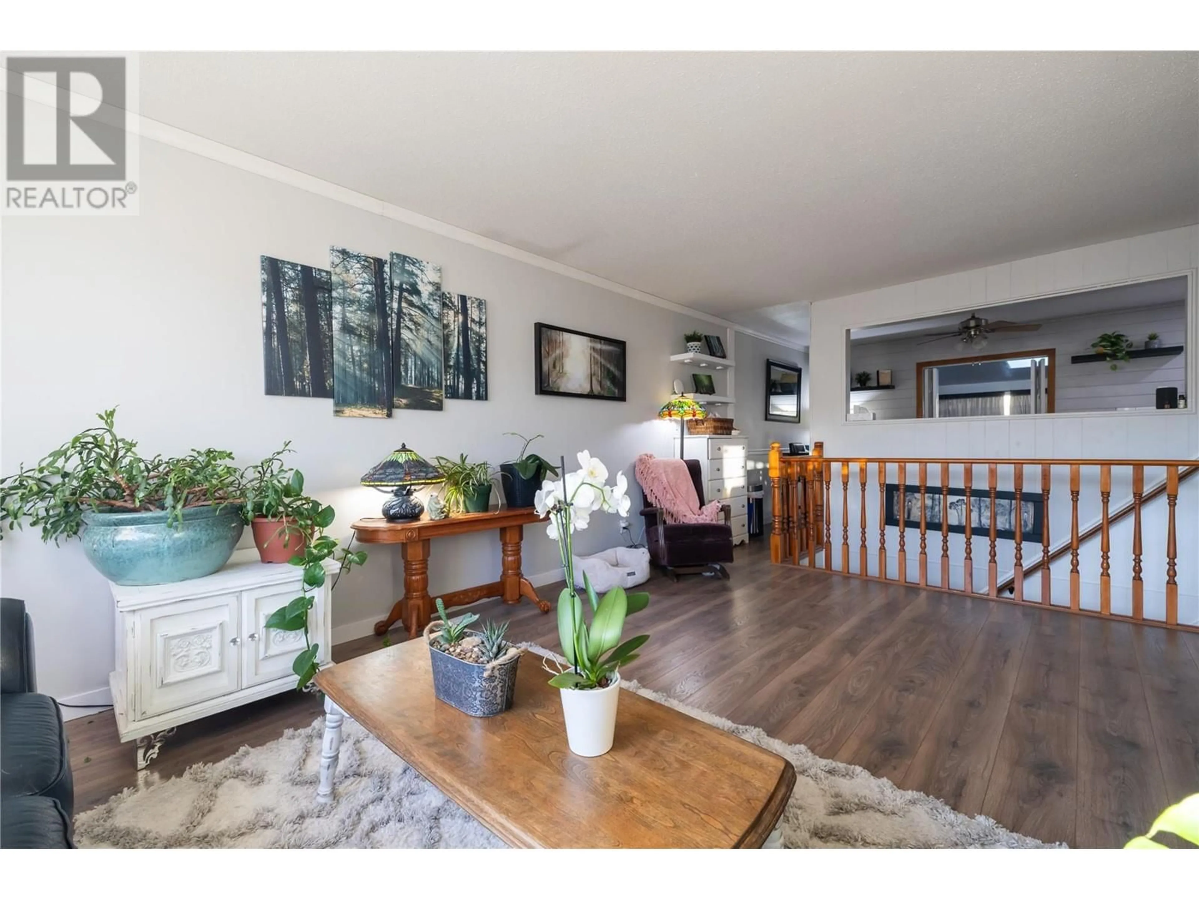 Living room with furniture, wood/laminate floor for 800 Valhalla Drive Unit# 64, Kamloops British Columbia V2B1R8