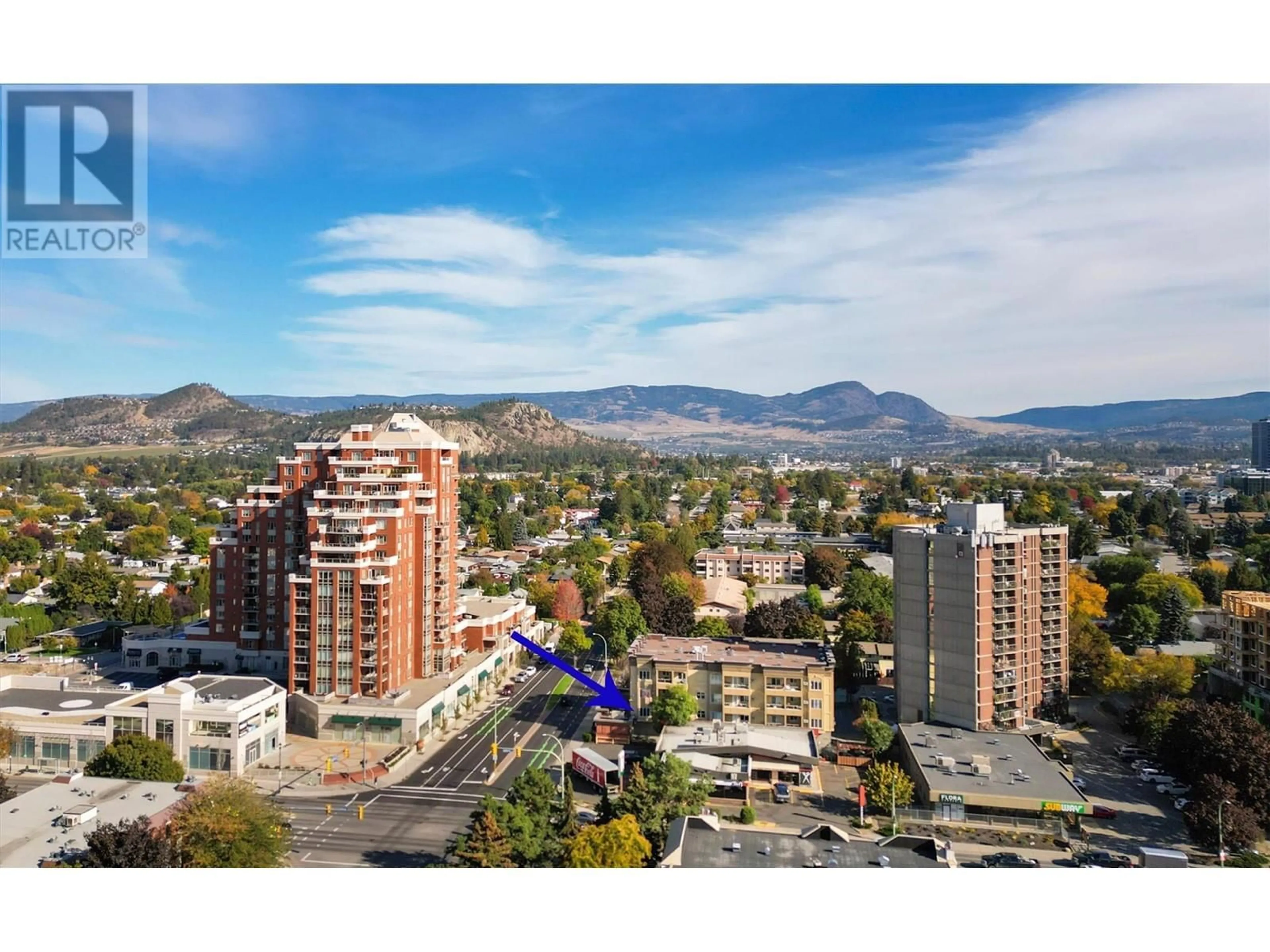 A pic from outside/outdoor area/front of a property/back of a property/a pic from drone, mountain view for 1125 Bernard Avenue Unit# 206, Kelowna British Columbia V1Y6R3