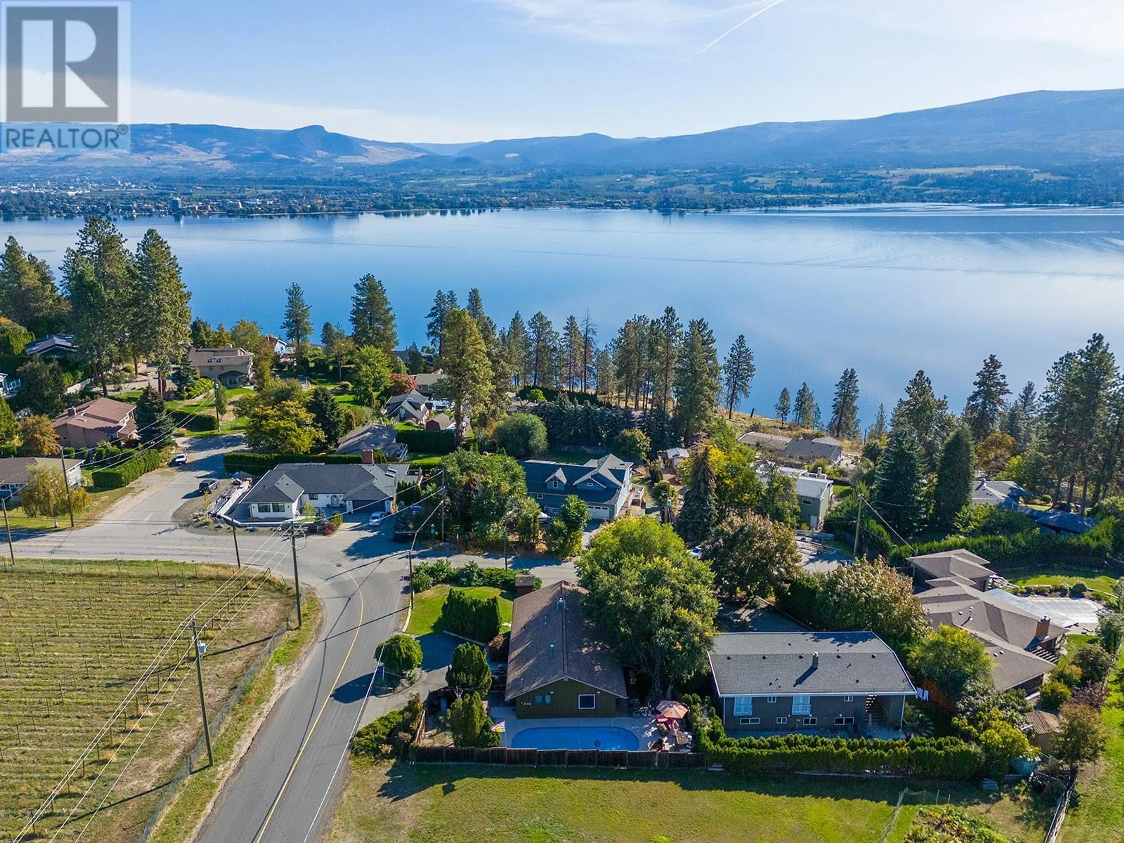 A pic from outside/outdoor area/front of a property/back of a property/a pic from drone, water/lake/river/ocean view for 2931 Thacker Drive, West Kelowna British Columbia V1Z1X1