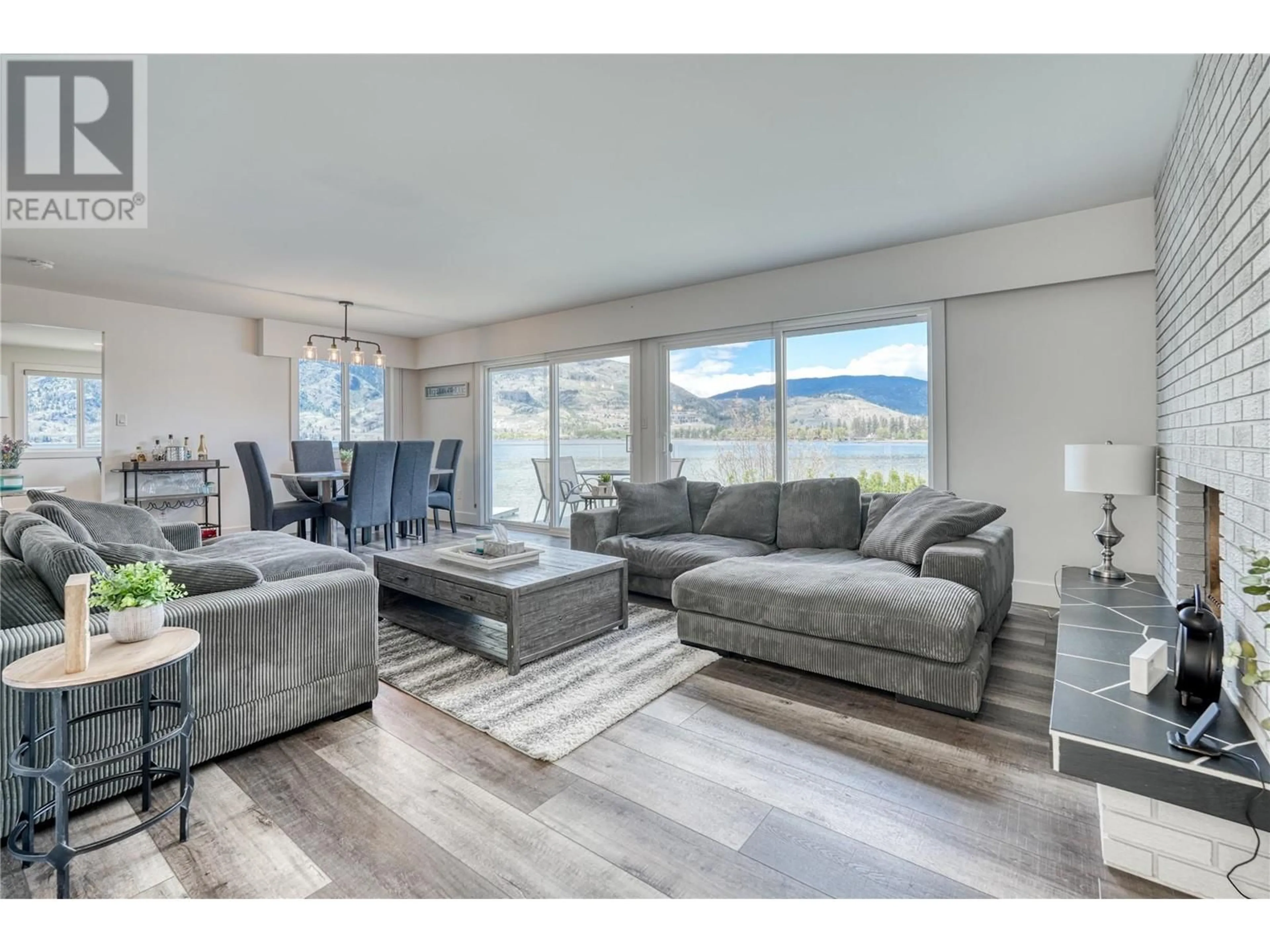 Living room with furniture, unknown for 3951 Lakeside Road, Penticton British Columbia V2A8W3