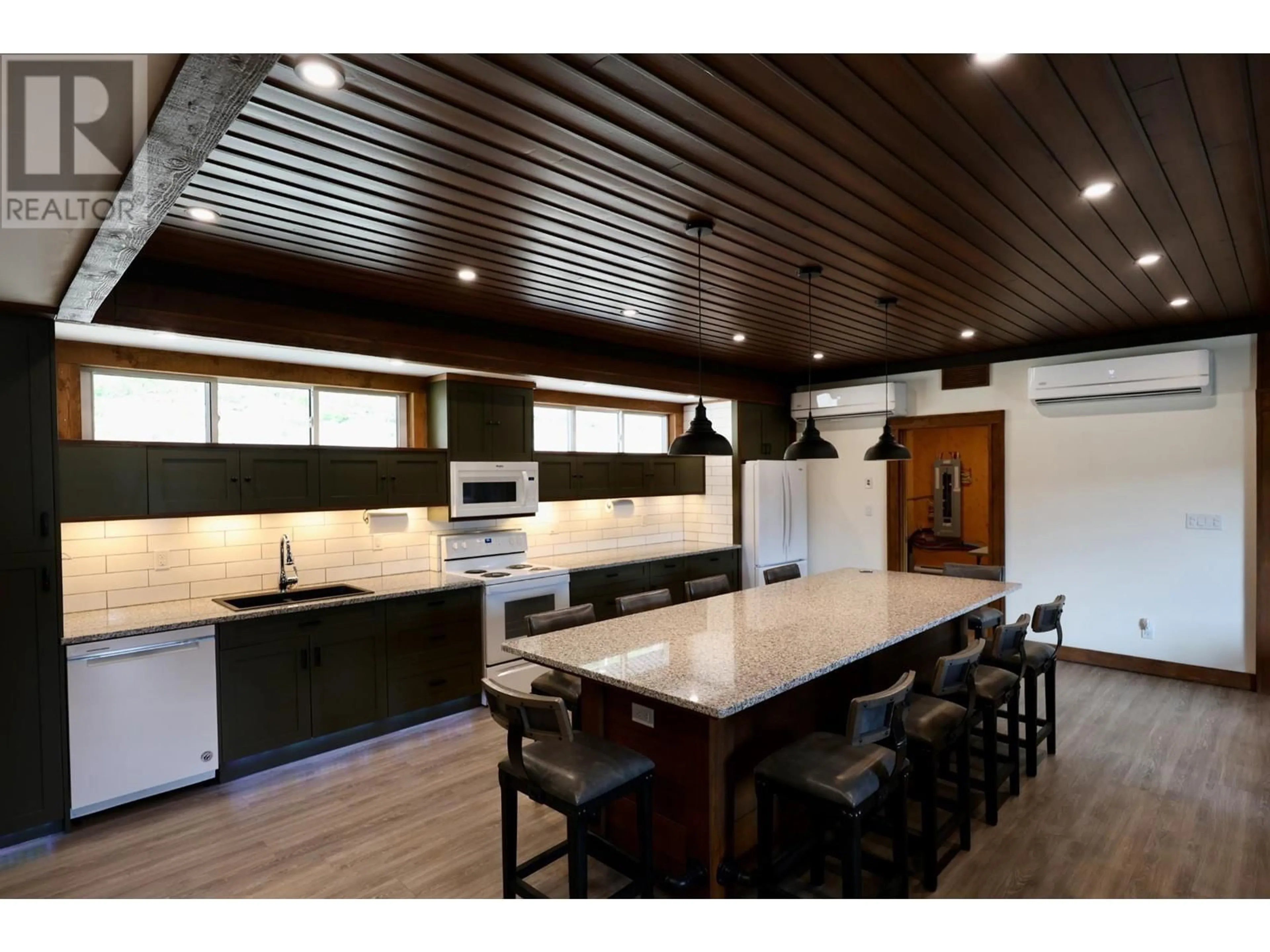 Open concept kitchen, wood/laminate floor for 4975 CASTLEDALE VIEW ESTATES Road, Golden British Columbia V0A1L0