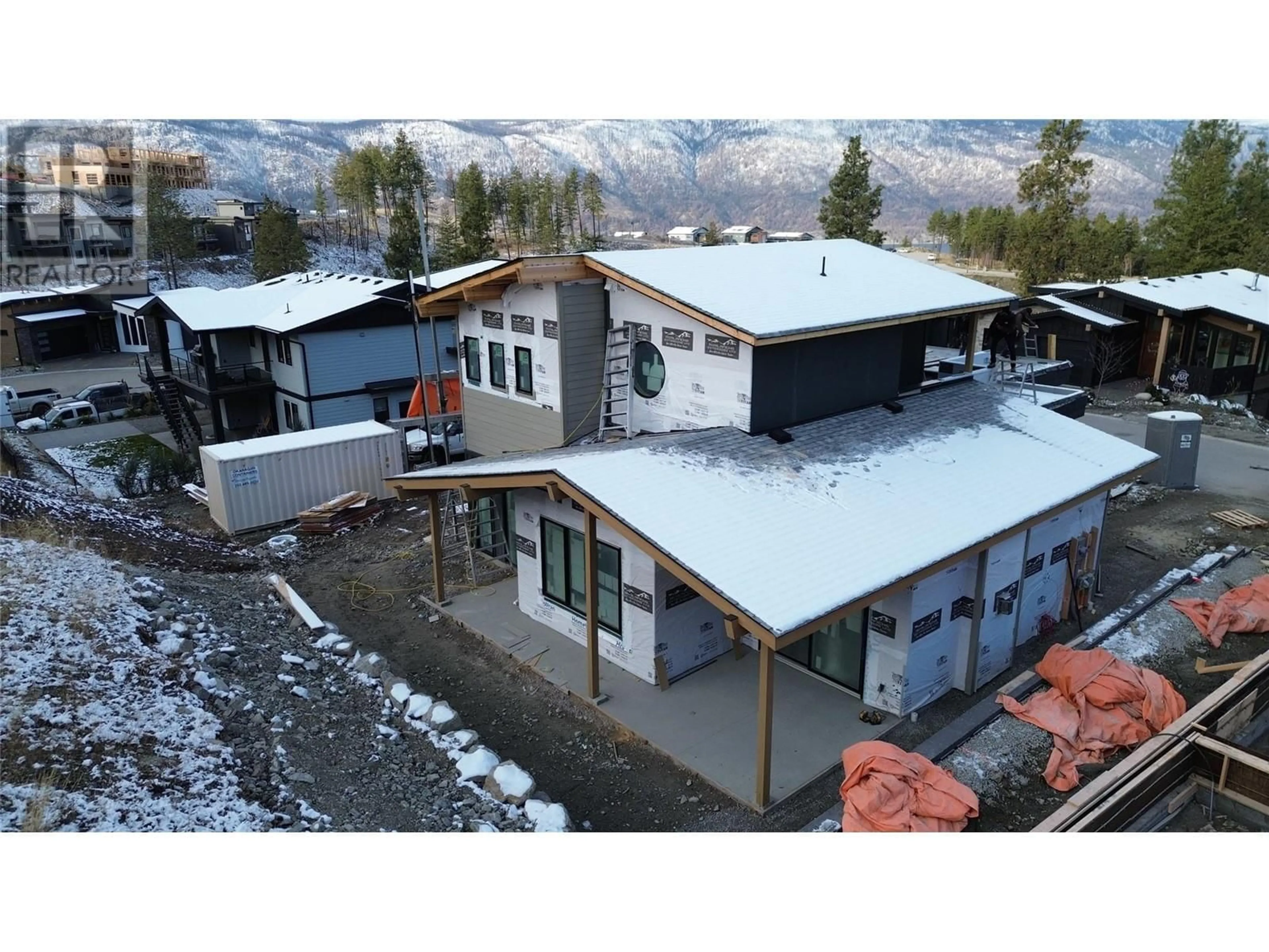 A pic from outside/outdoor area/front of a property/back of a property/a pic from drone, building for 1960 Northern Flicker Court Unit# 11, Kelowna British Columbia V1V0G3