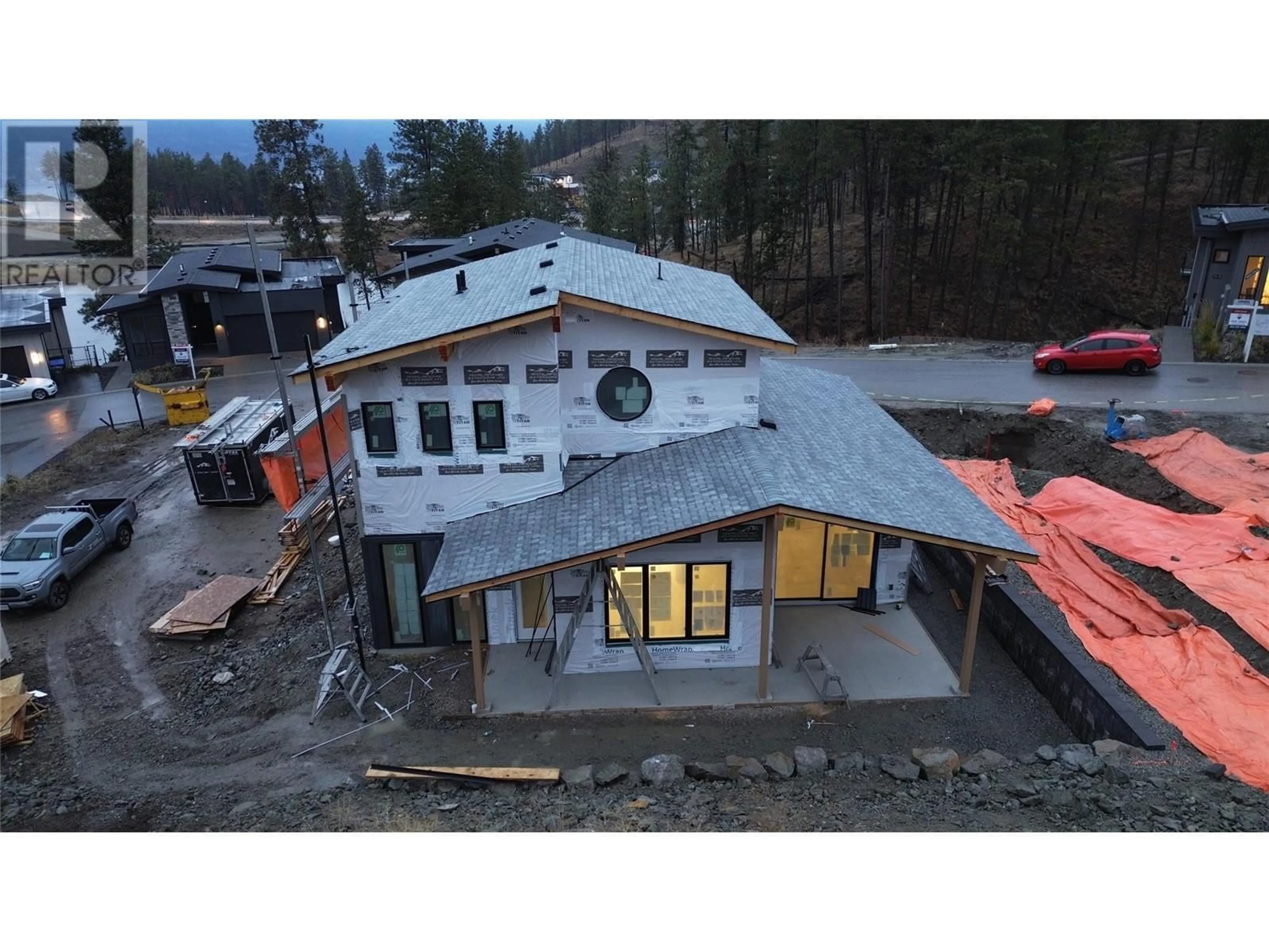 A pic from outside/outdoor area/front of a property/back of a property/a pic from drone, building for 1960 Northern Flicker Court Unit# 11, Kelowna British Columbia V1V0G3