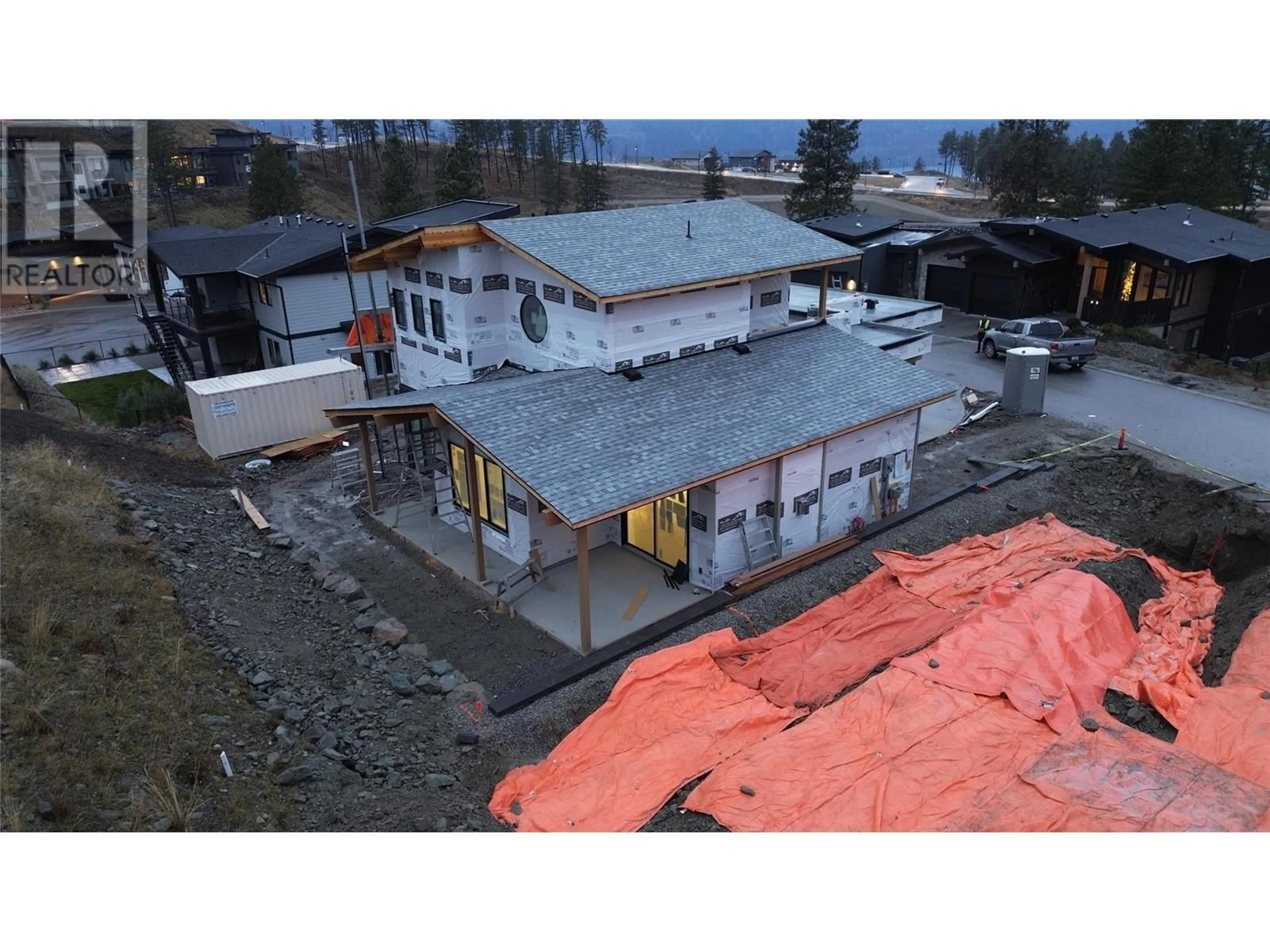 A pic from outside/outdoor area/front of a property/back of a property/a pic from drone, building for 1960 Northern Flicker Court Unit# 11, Kelowna British Columbia V1V0G3