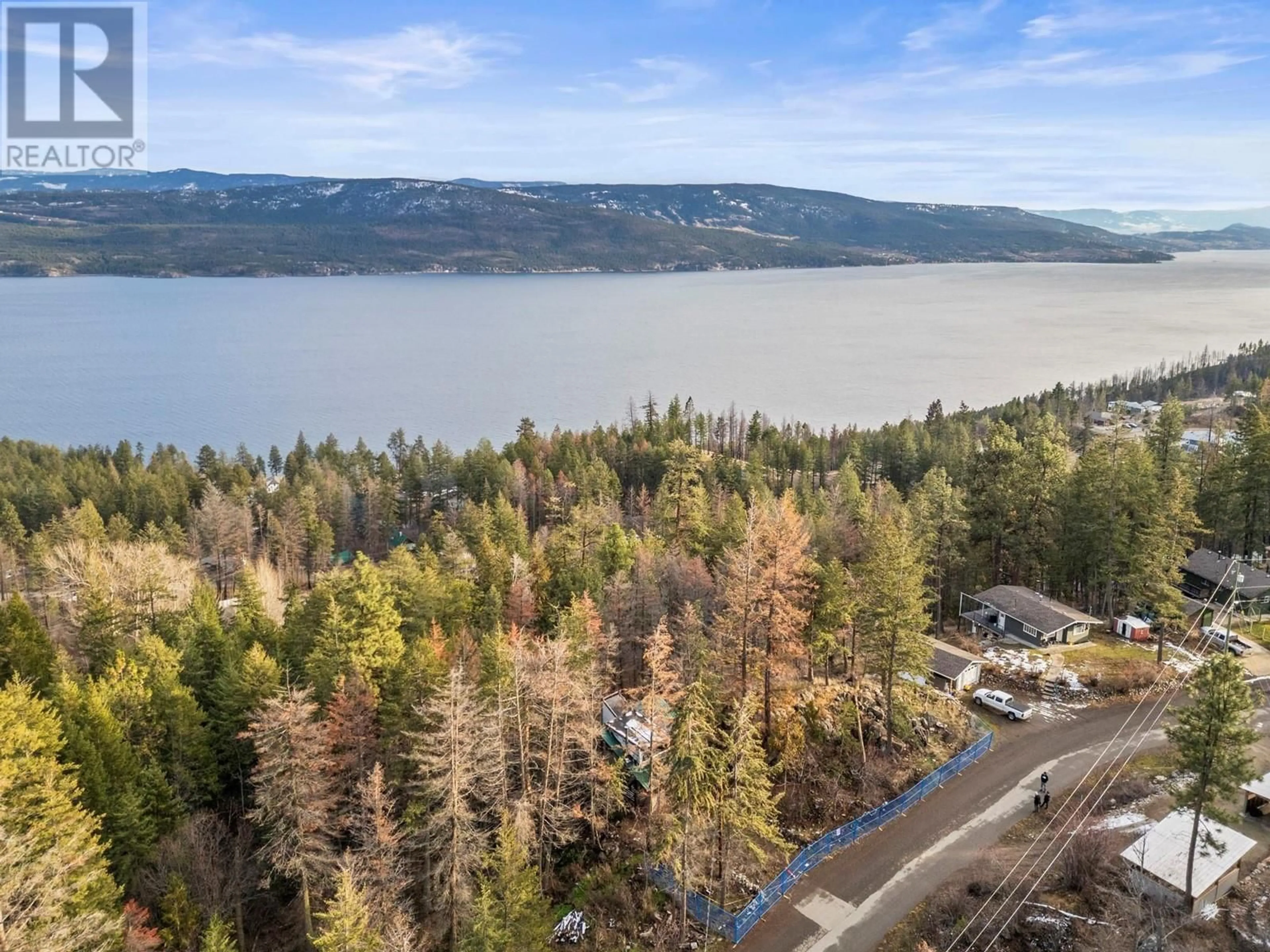 A pic from outside/outdoor area/front of a property/back of a property/a pic from drone, water/lake/river/ocean view for 9357 Winchester Road Lot# LOT 11, Vernon British Columbia V1H2E1