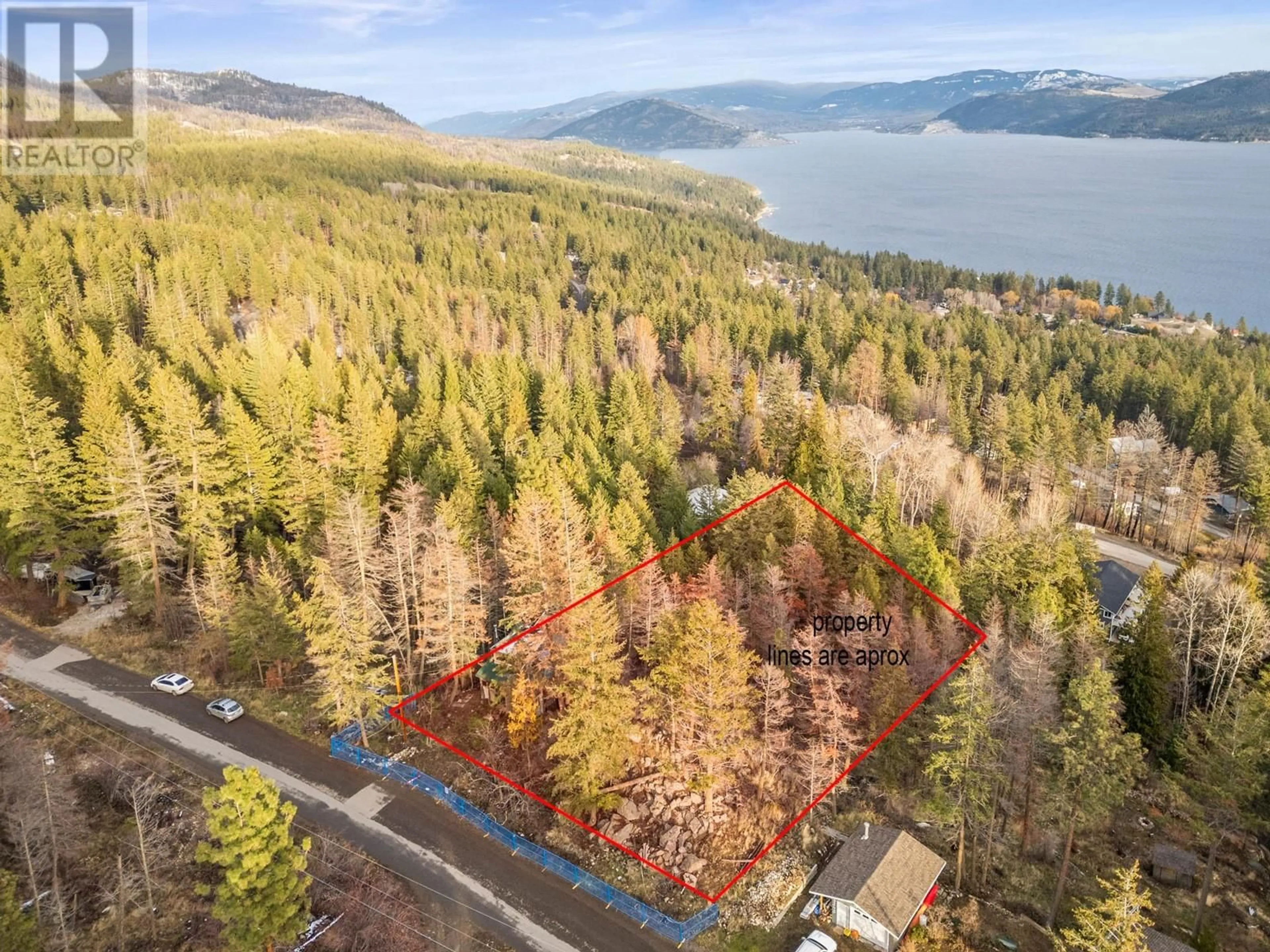 A pic from outside/outdoor area/front of a property/back of a property/a pic from drone, water/lake/river/ocean view for 9357 Winchester Road Lot# LOT 11, Vernon British Columbia V1H2E1