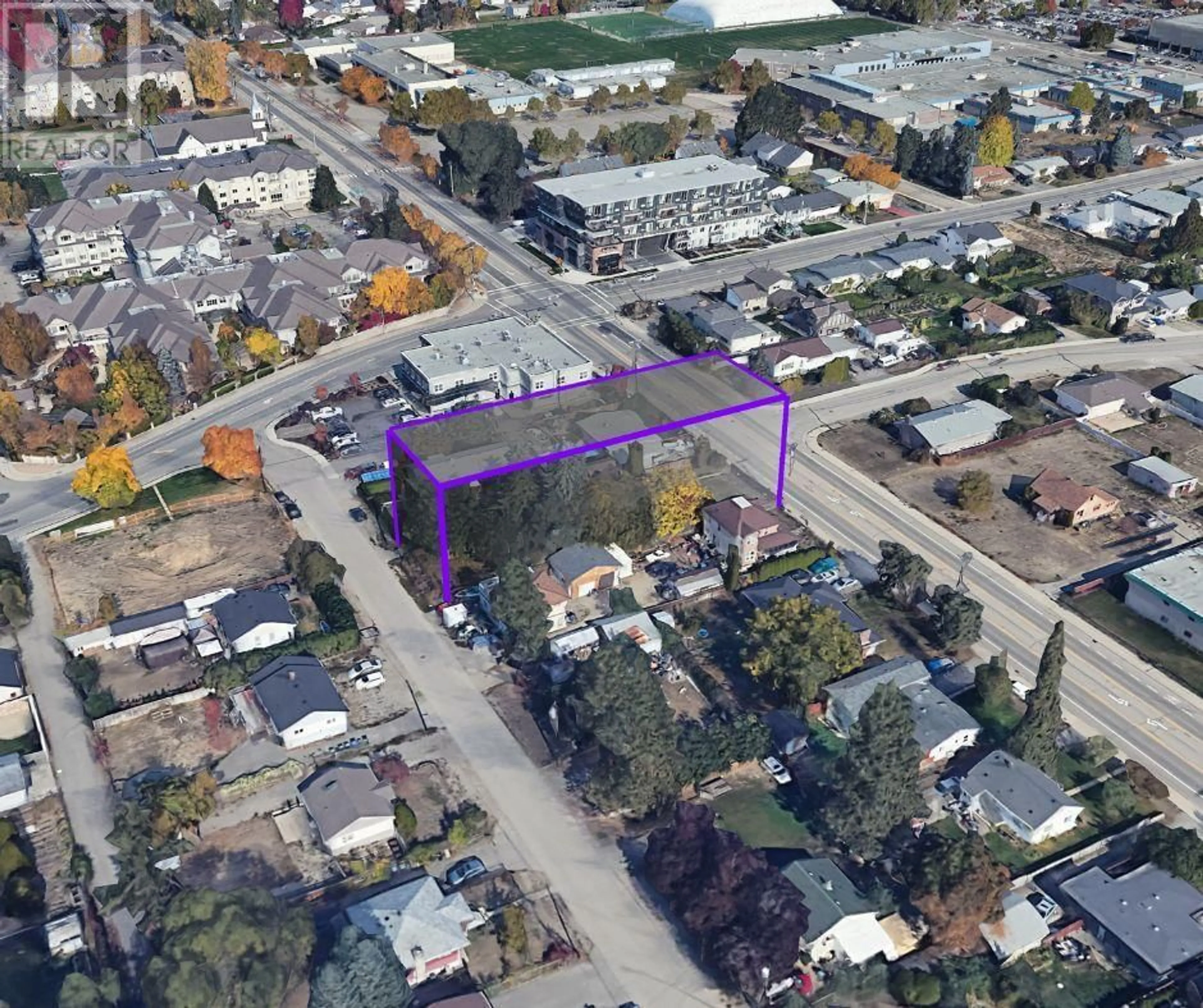 A pic from outside/outdoor area/front of a property/back of a property/a pic from drone, street for 520 Rutland Road N, Kelowna British Columbia V1X3B4