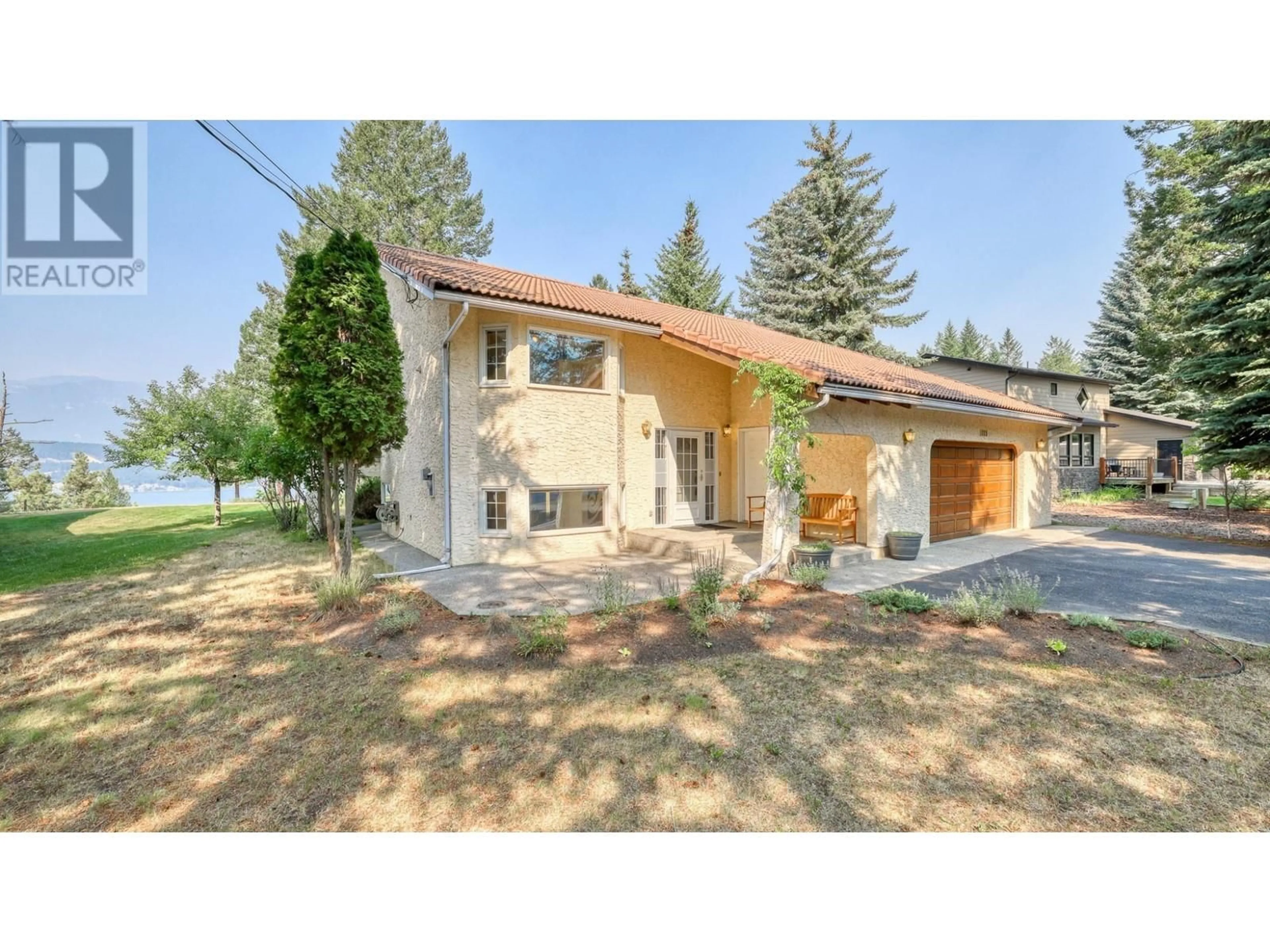 A pic from outside/outdoor area/front of a property/back of a property/a pic from drone, street for 1089 SCENIC Place, Windermere British Columbia V0B2L1