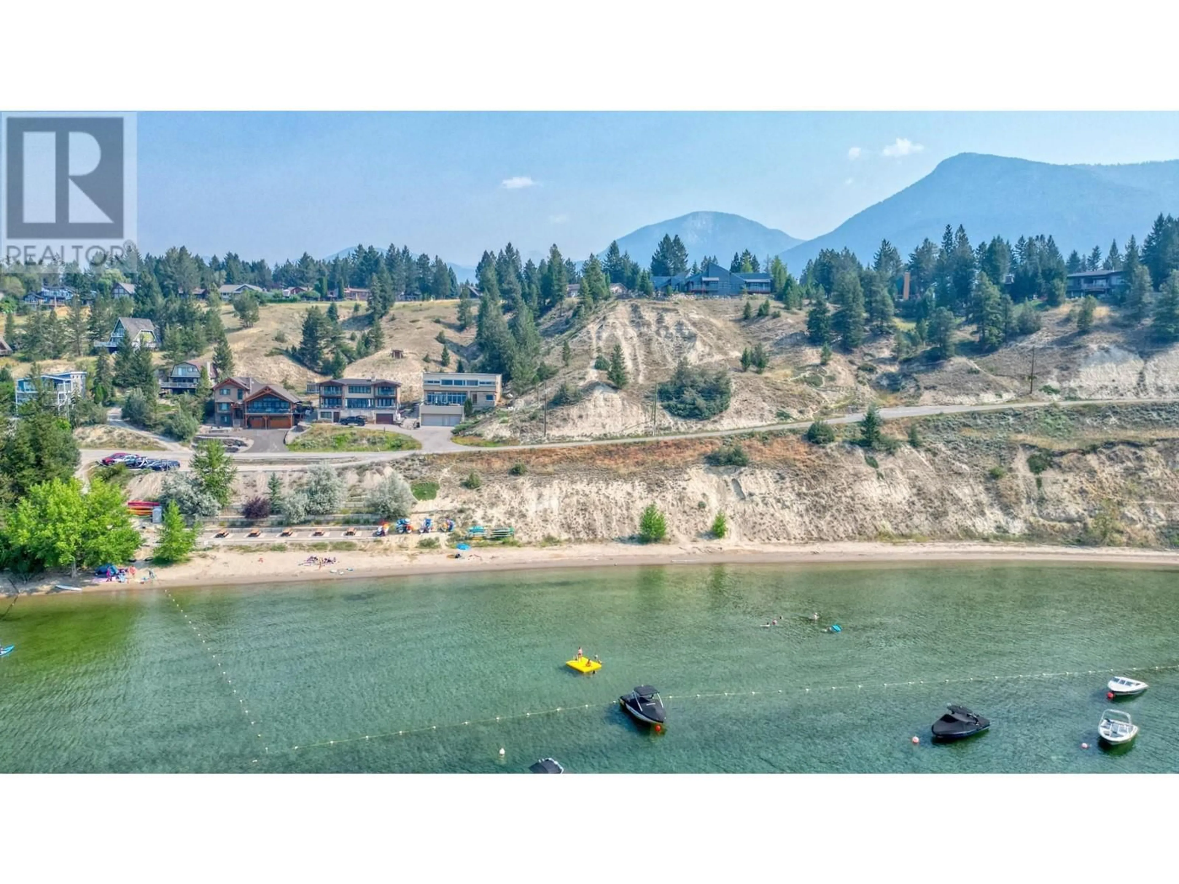 A pic from outside/outdoor area/front of a property/back of a property/a pic from drone, water/lake/river/ocean view for 1089 SCENIC Place, Windermere British Columbia V0B2L1