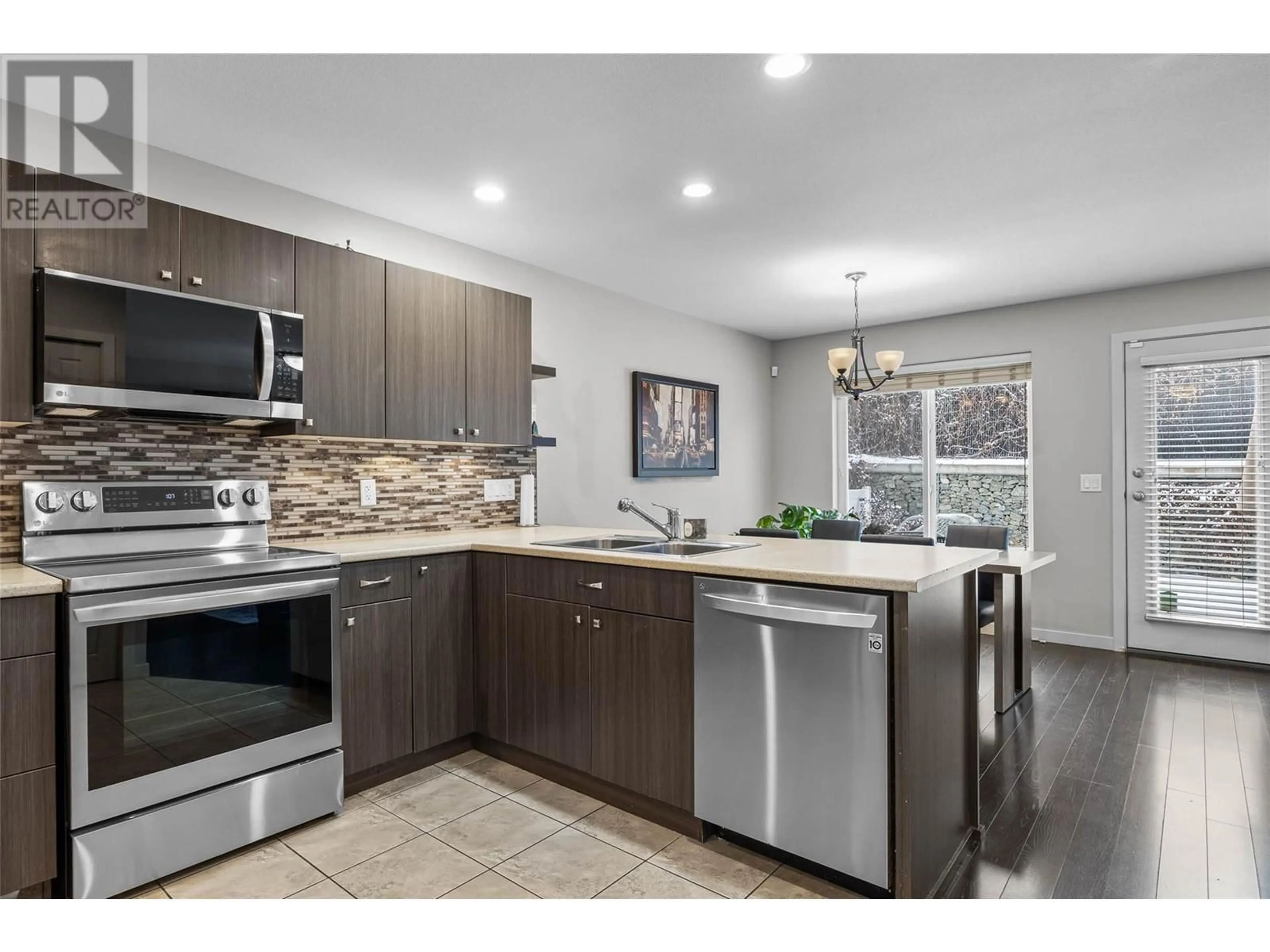 Open concept kitchen, ceramic/tile floor for 1250 Aberdeen Drive Unit# 26, Kamloops British Columbia V1S0C1