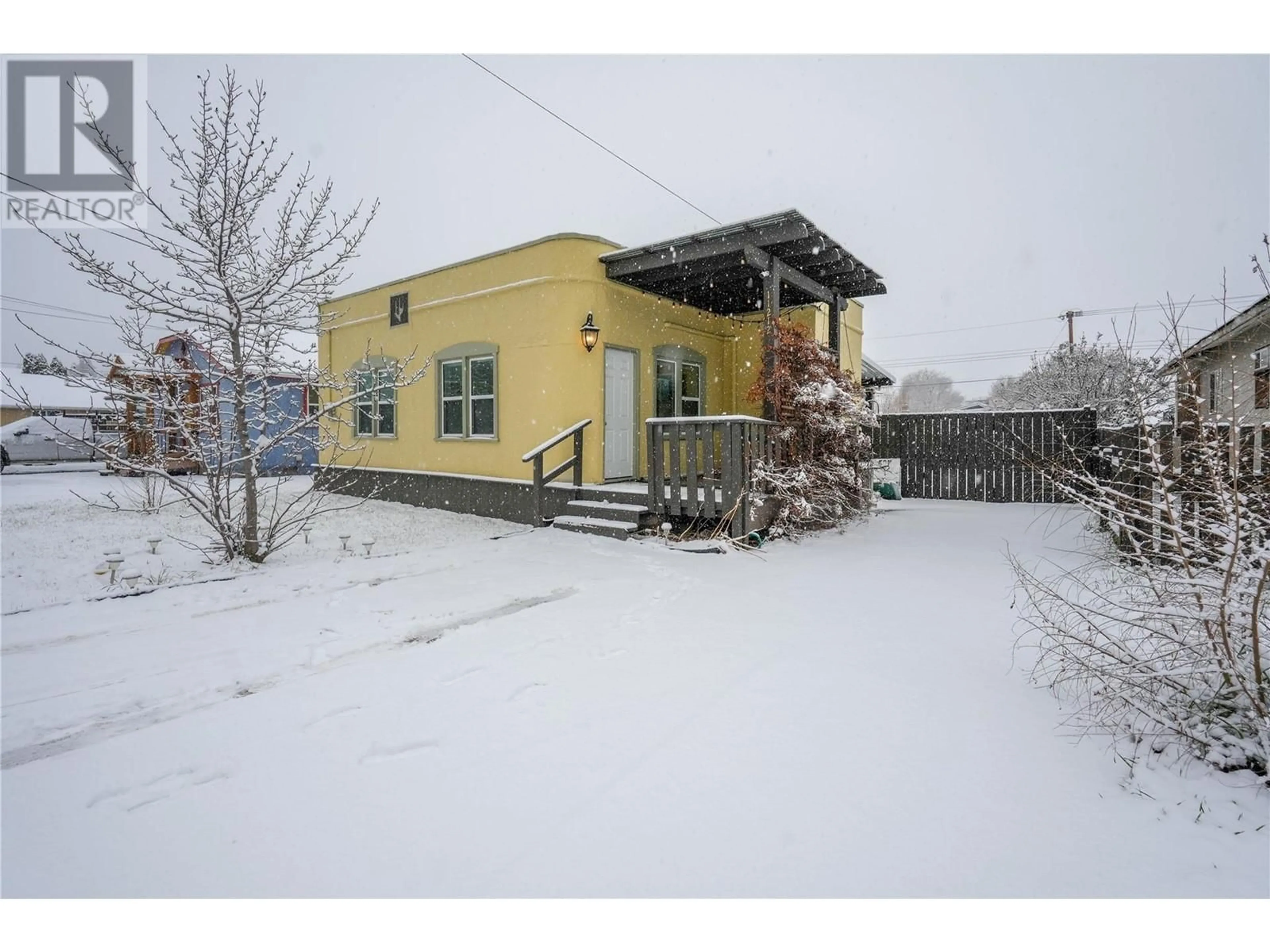 A pic from outside/outdoor area/front of a property/back of a property/a pic from drone, street for 11212 VICTORIA Road, Summerland British Columbia V0H1Z2